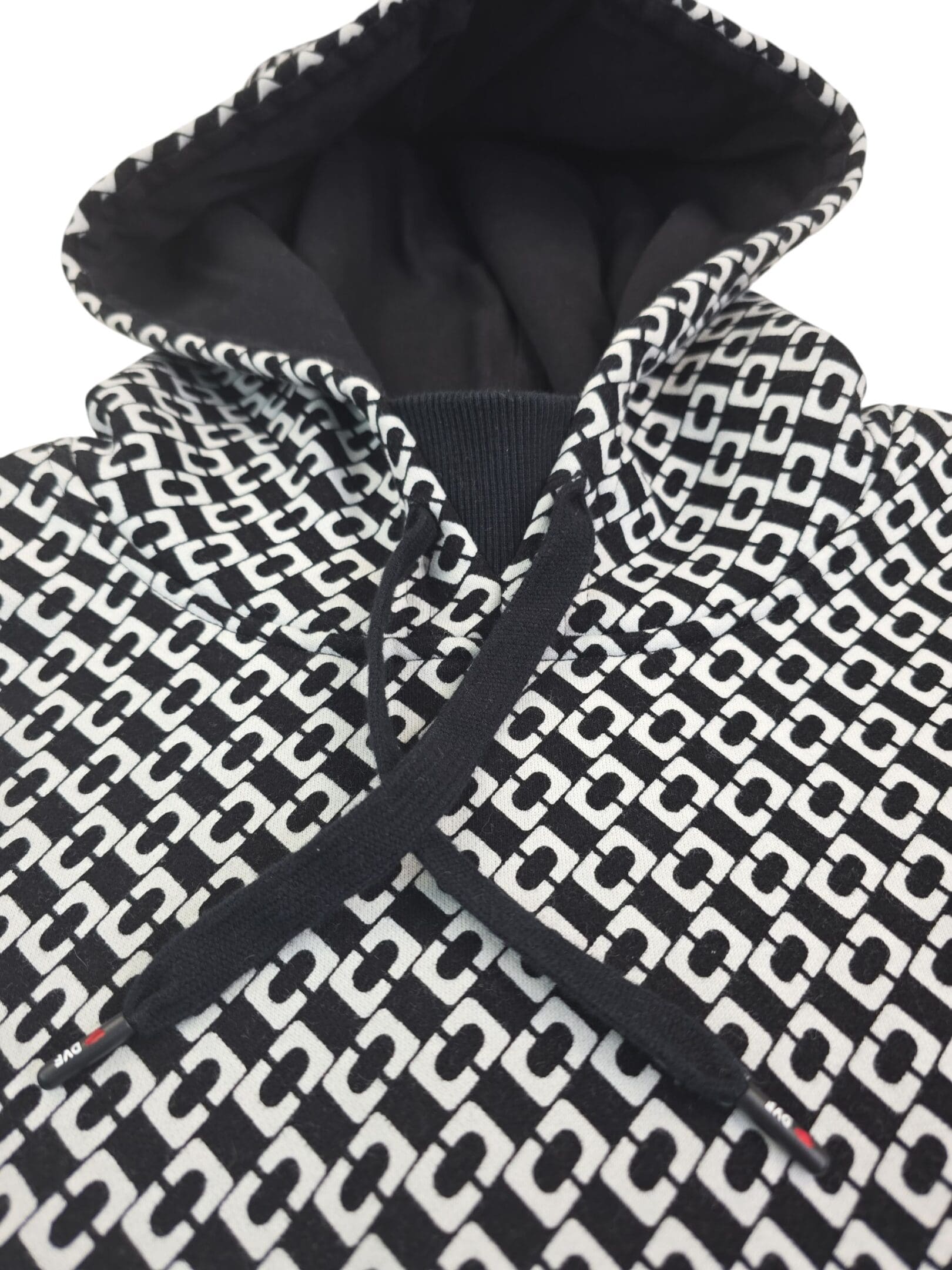 Close-up of front of Diane von Furstenberg x Skechers women’s plus size 3XL hoodie showing geometric print and drawstring hood