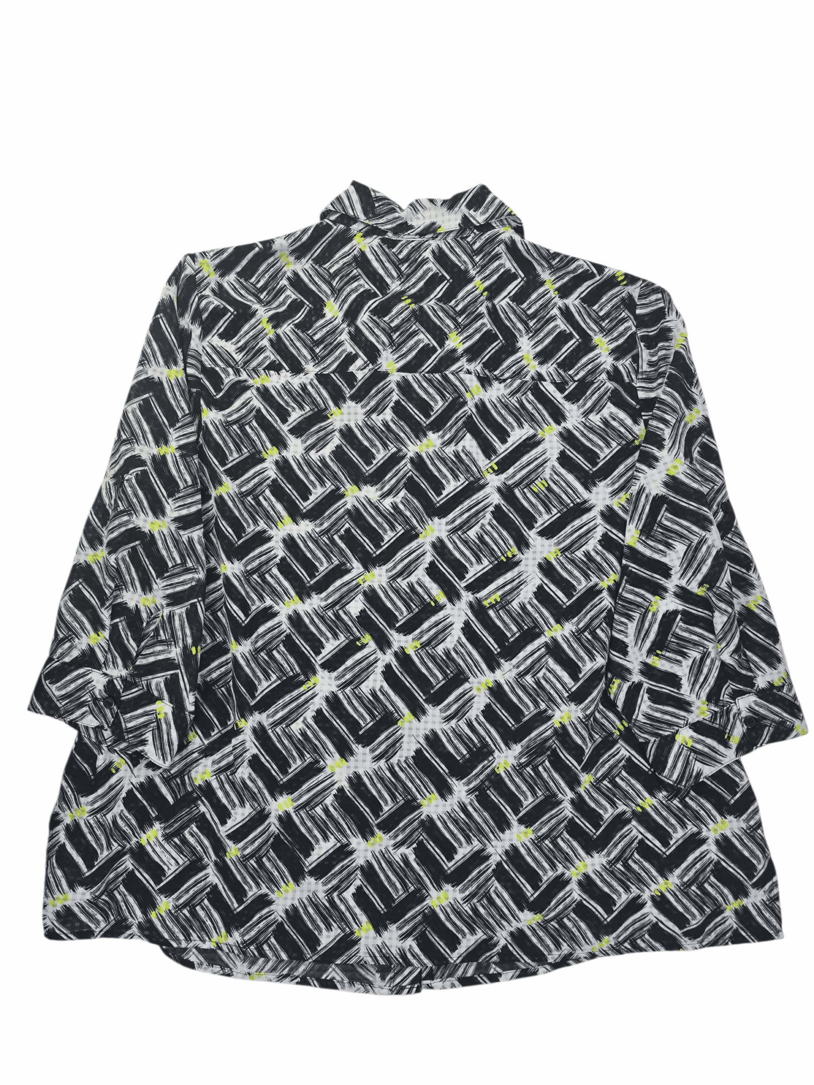 Back view of Kim Rogers black and white paint stroke roll tab top showing continuous pattern and curved hem.