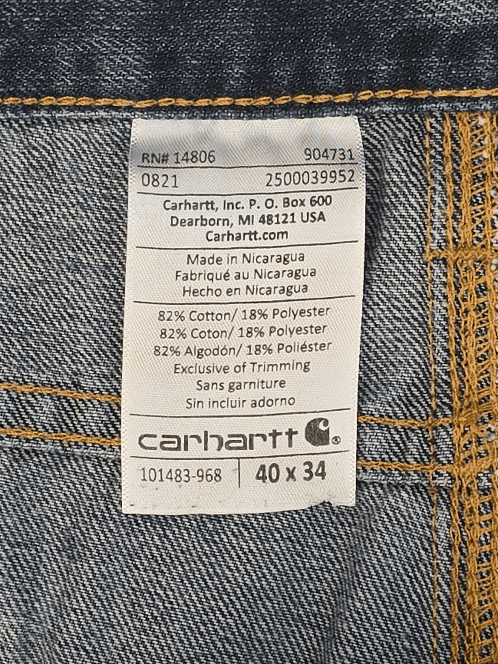 Fabric content tag from Carhartt blue straight leg jeans men’s big & tall size 40x34