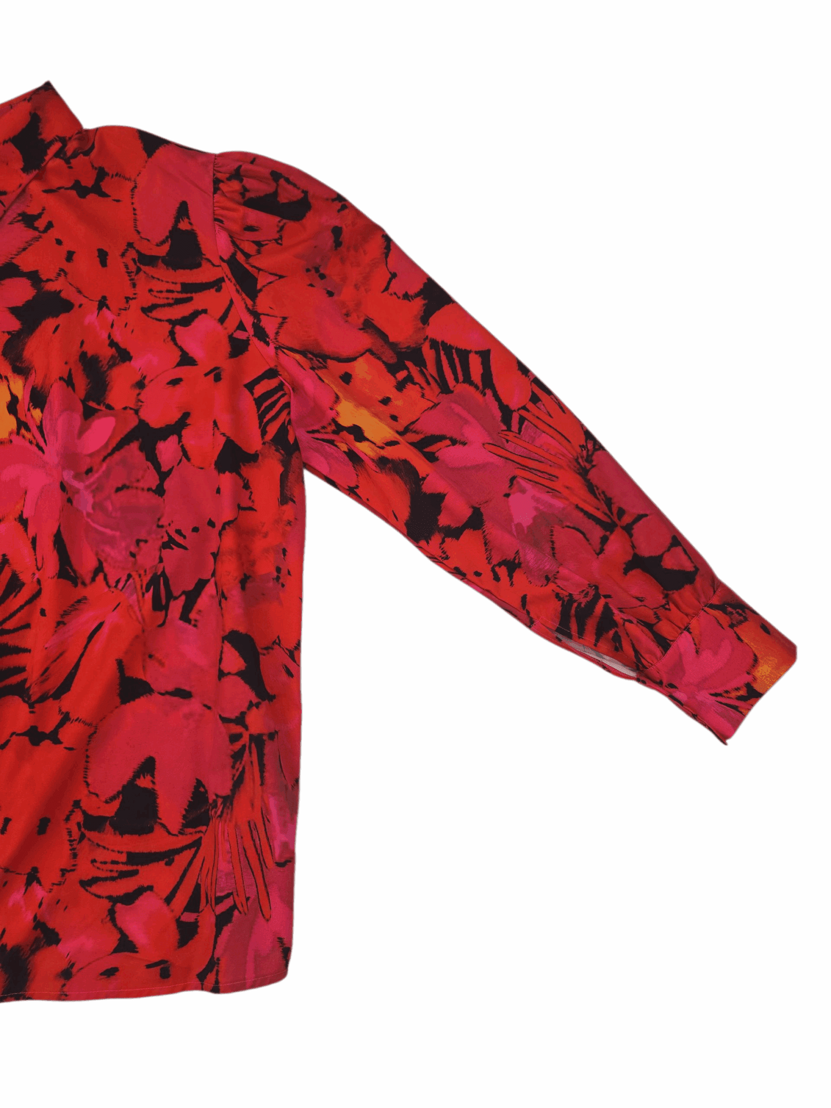 Red and pink floral patterned long sleeve shirt sleeve.