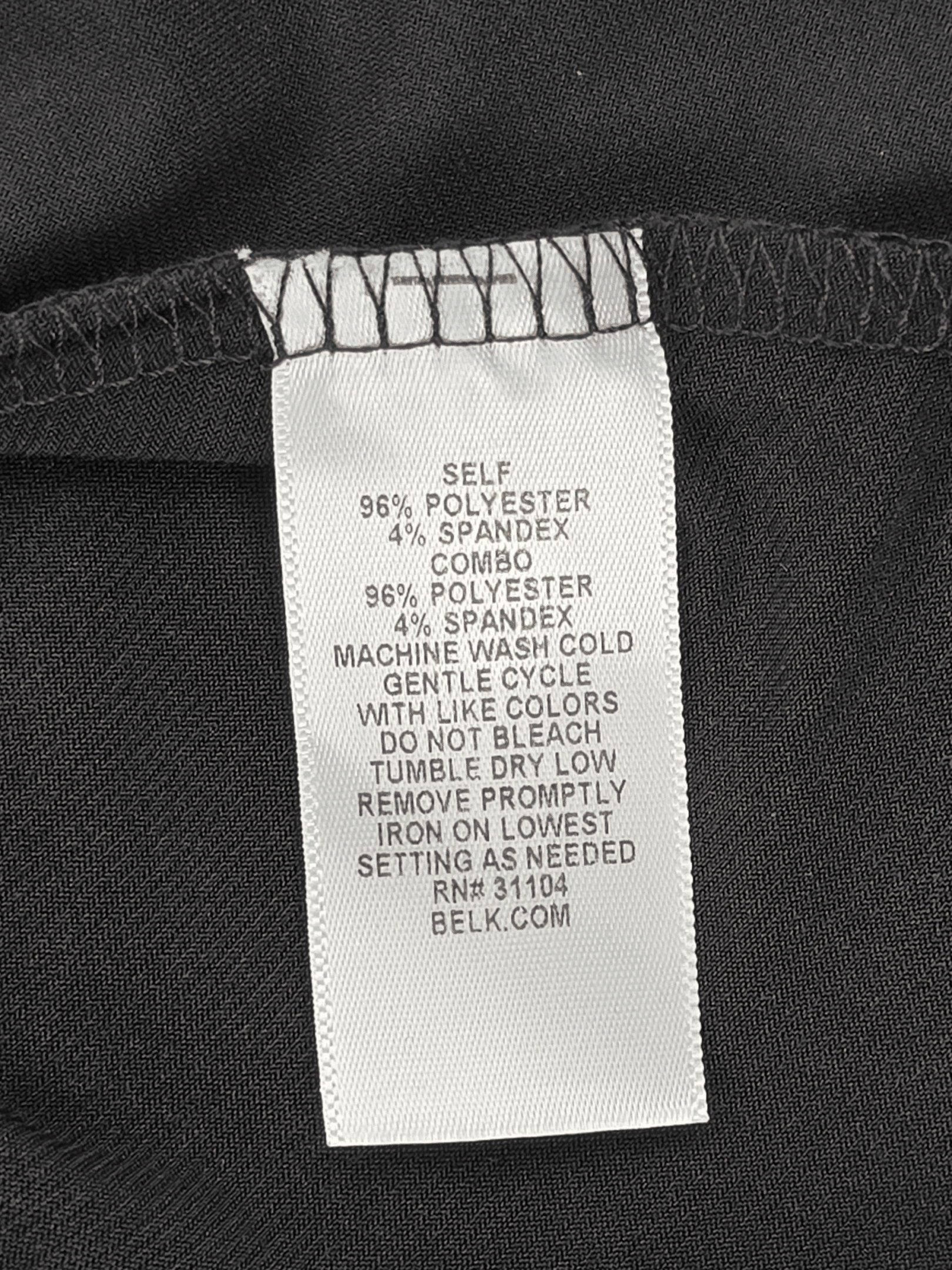 Fabric content tag from Kim Rogers black & silver sparkle pullover top size 3X