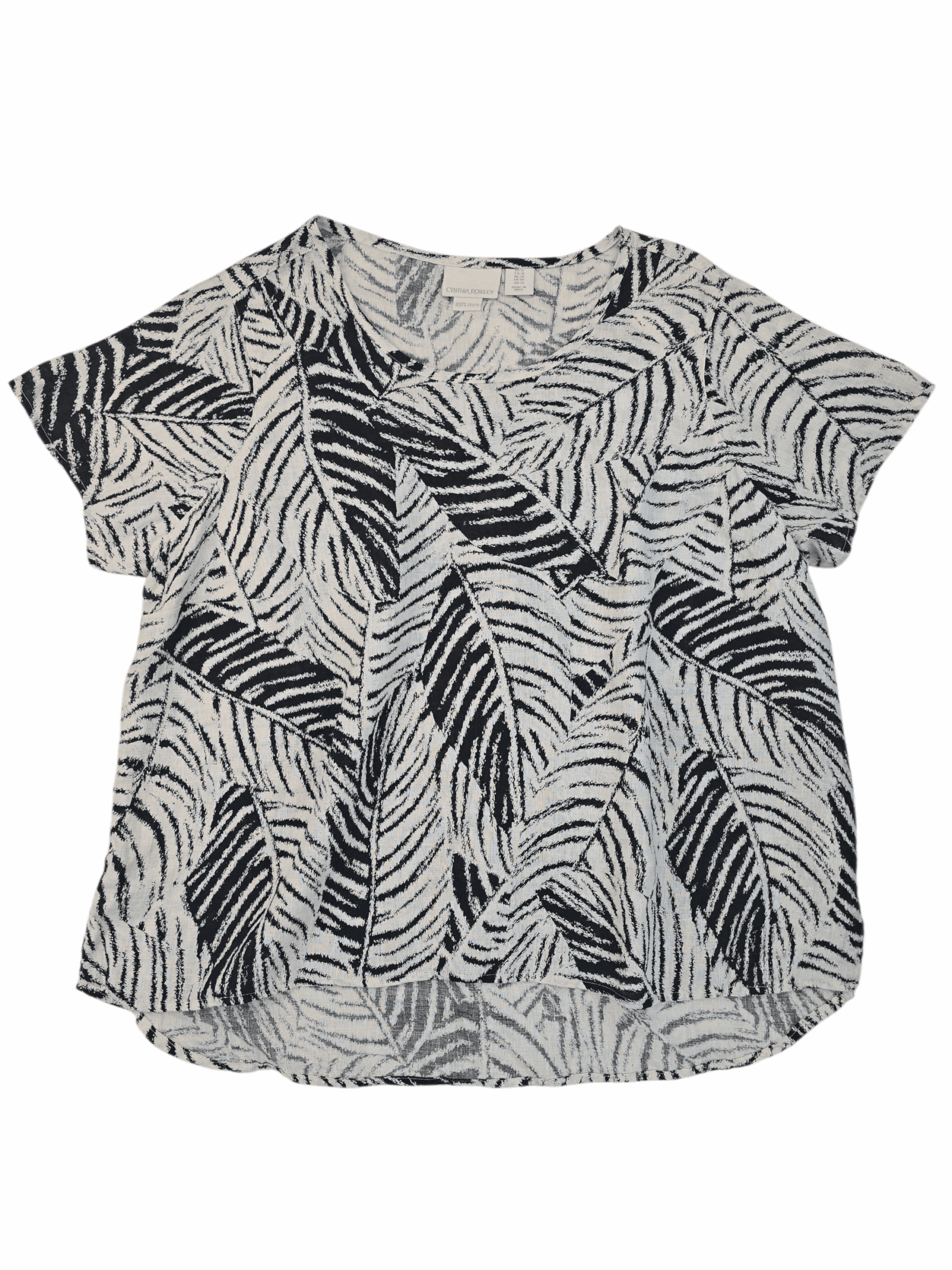 Short-sleeve blouse with black and white abstract leaf pattern.
