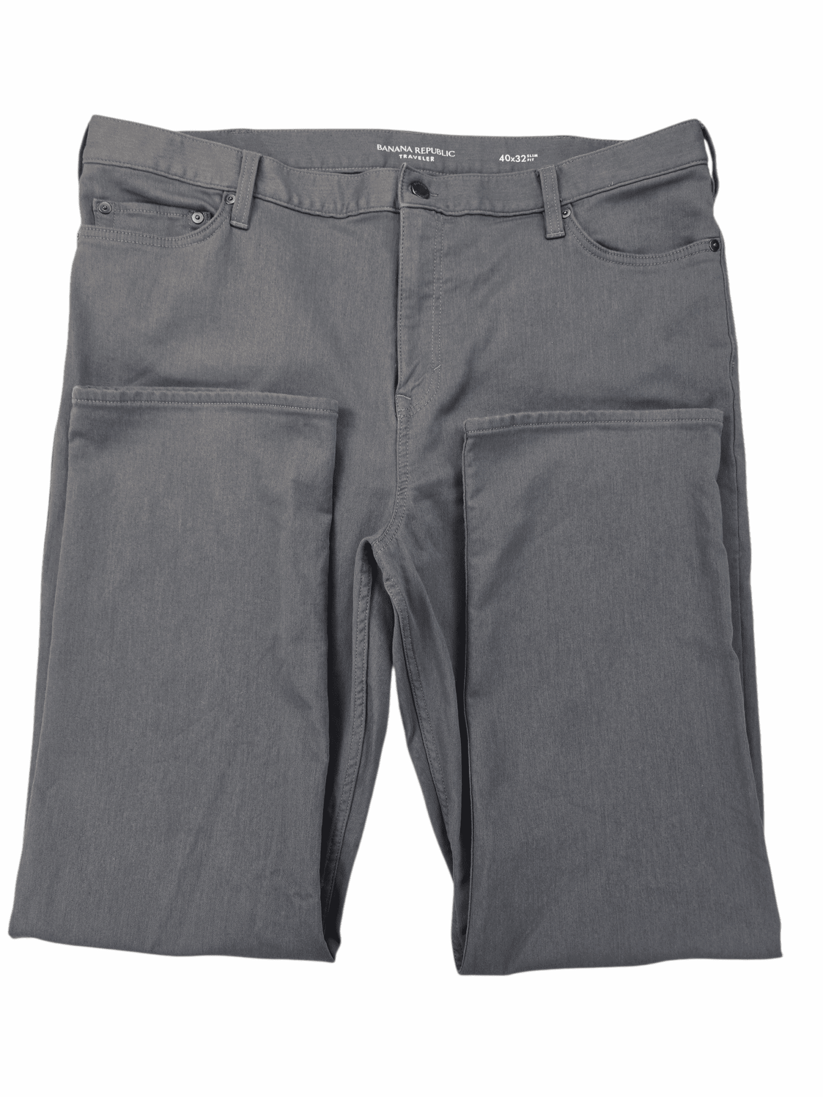 Gray men's trousers laid flat on a white surface.