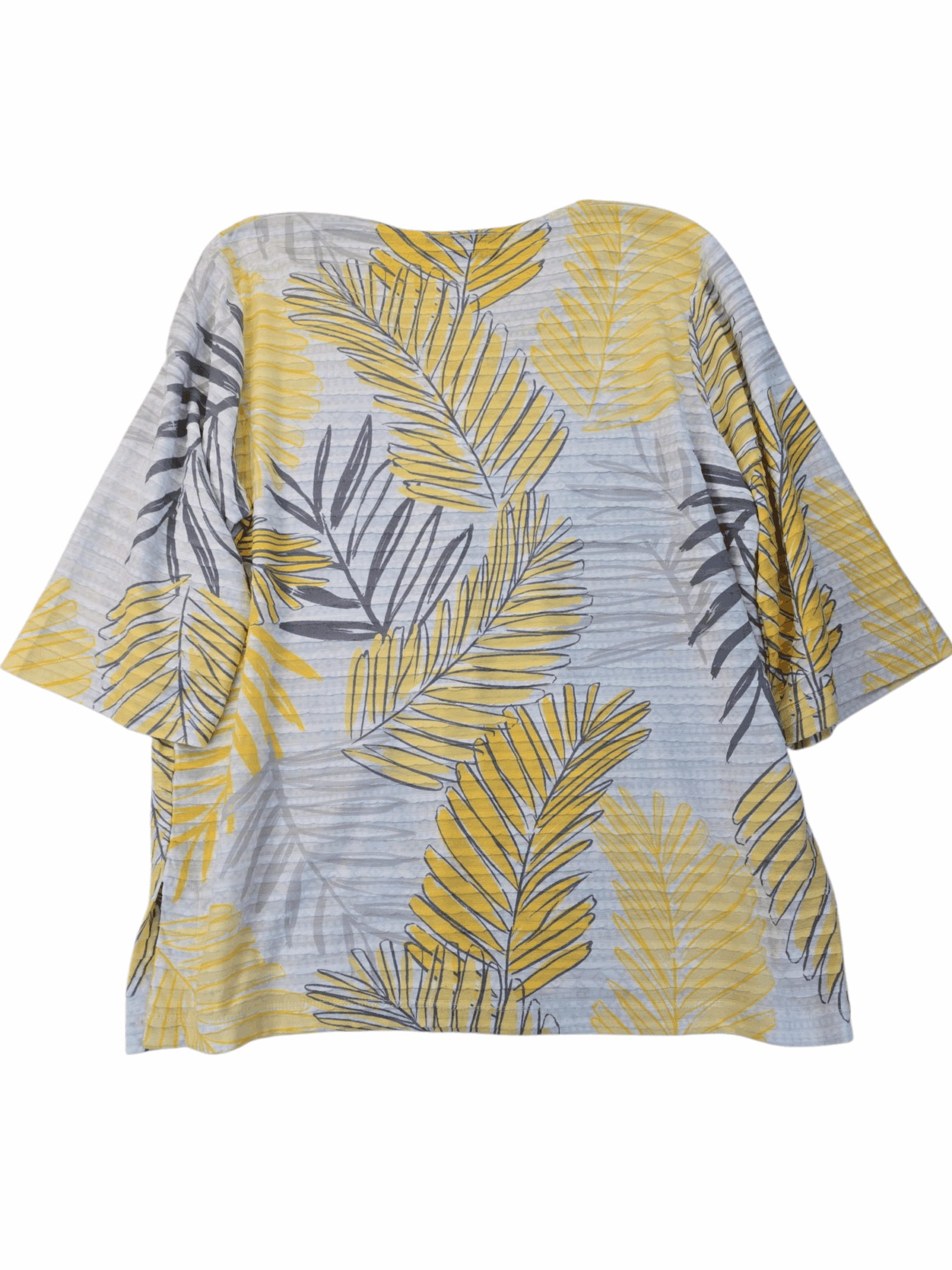 A short-sleeved shirt with yellow and gray leaf patterns.