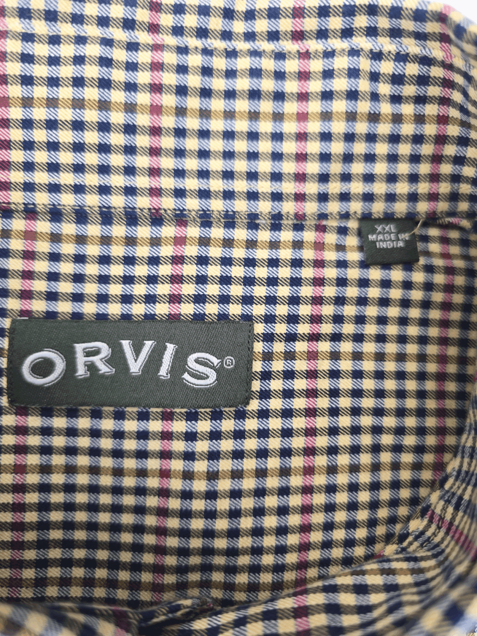 Orvis brand and size tag on red and blue check long sleeve button-up shirt in men’s size 2X.