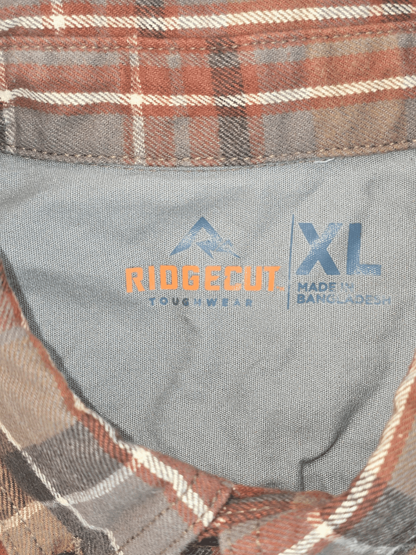 Ridgecut Toughwear brand and size tag on green plaid cotton flannel shirt men’s size XL