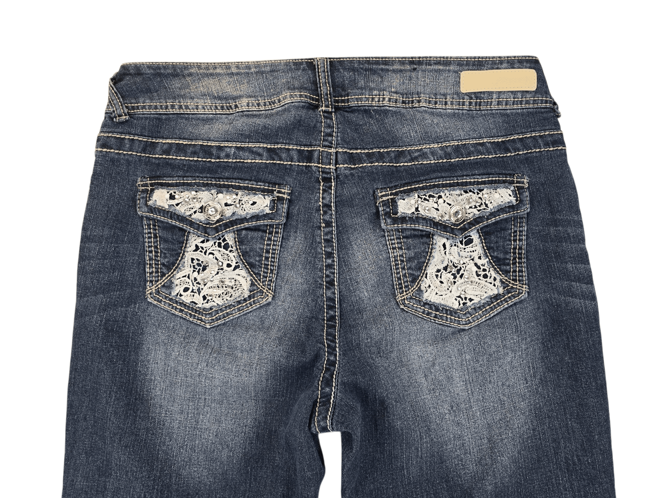 Close-up of Wallflower blue denim capris showing waistband, button, and back pocket detail.