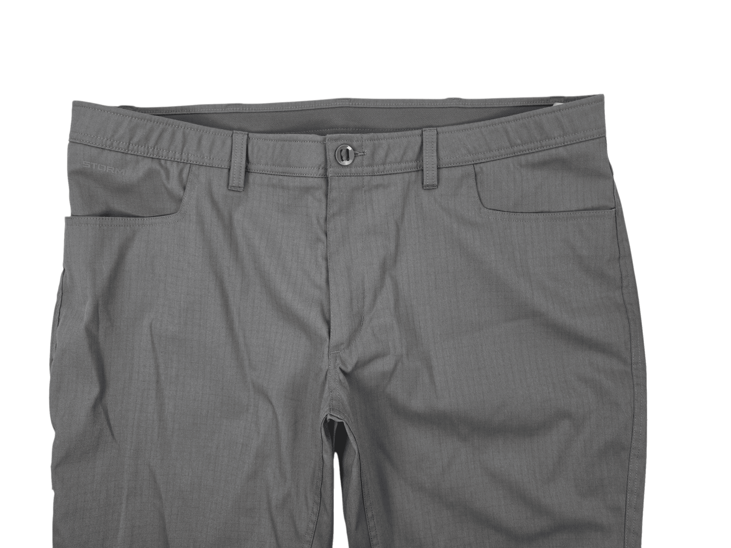 Close-up of front of Under Armour men’s Big & Tall size 44 Storm Quick-Dry ripstop pants showing fabric and zipper detail