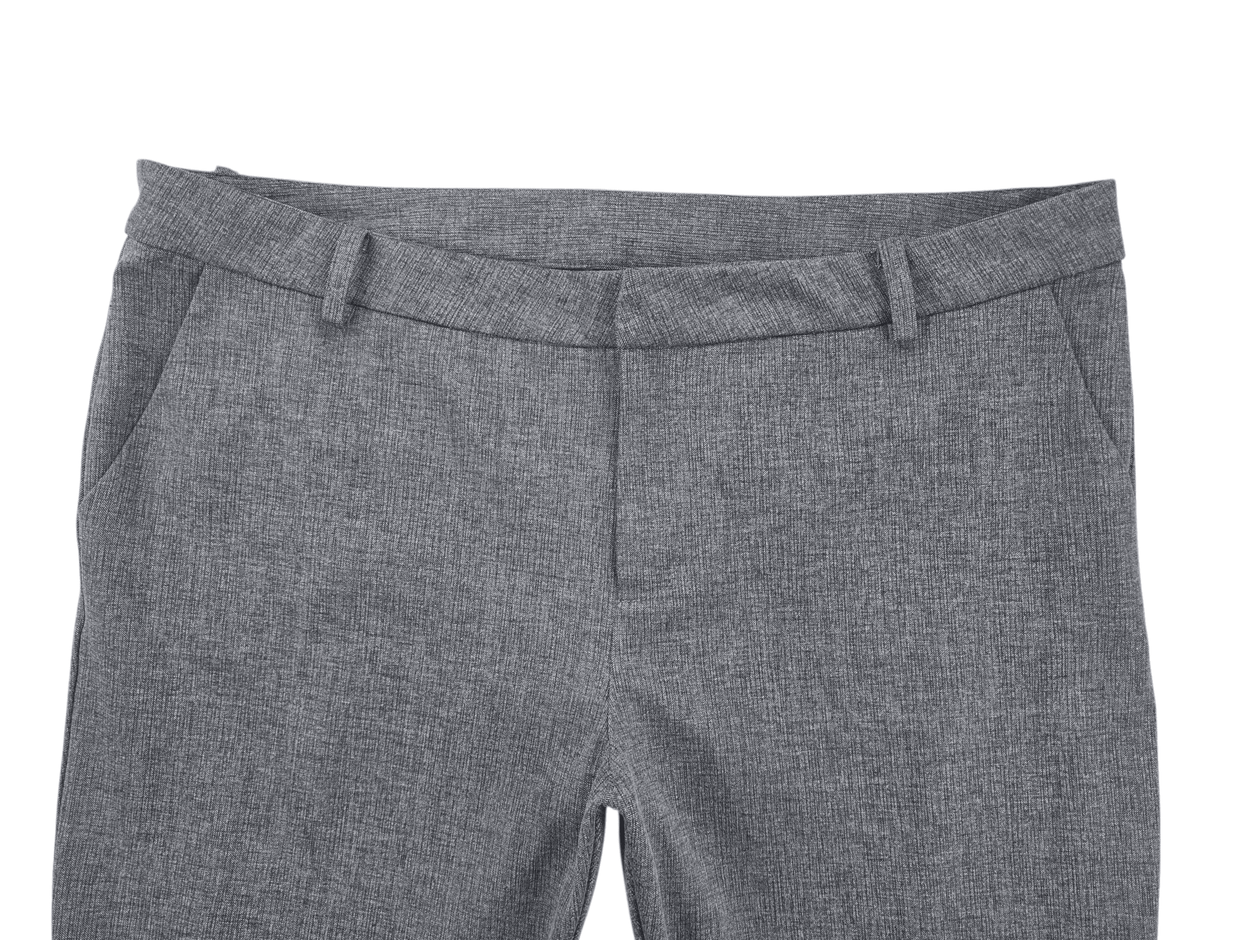 Close-up of gray dress pants with belt loops and front pockets.