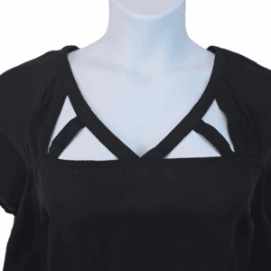 Black top with geometric cutout neckline design.