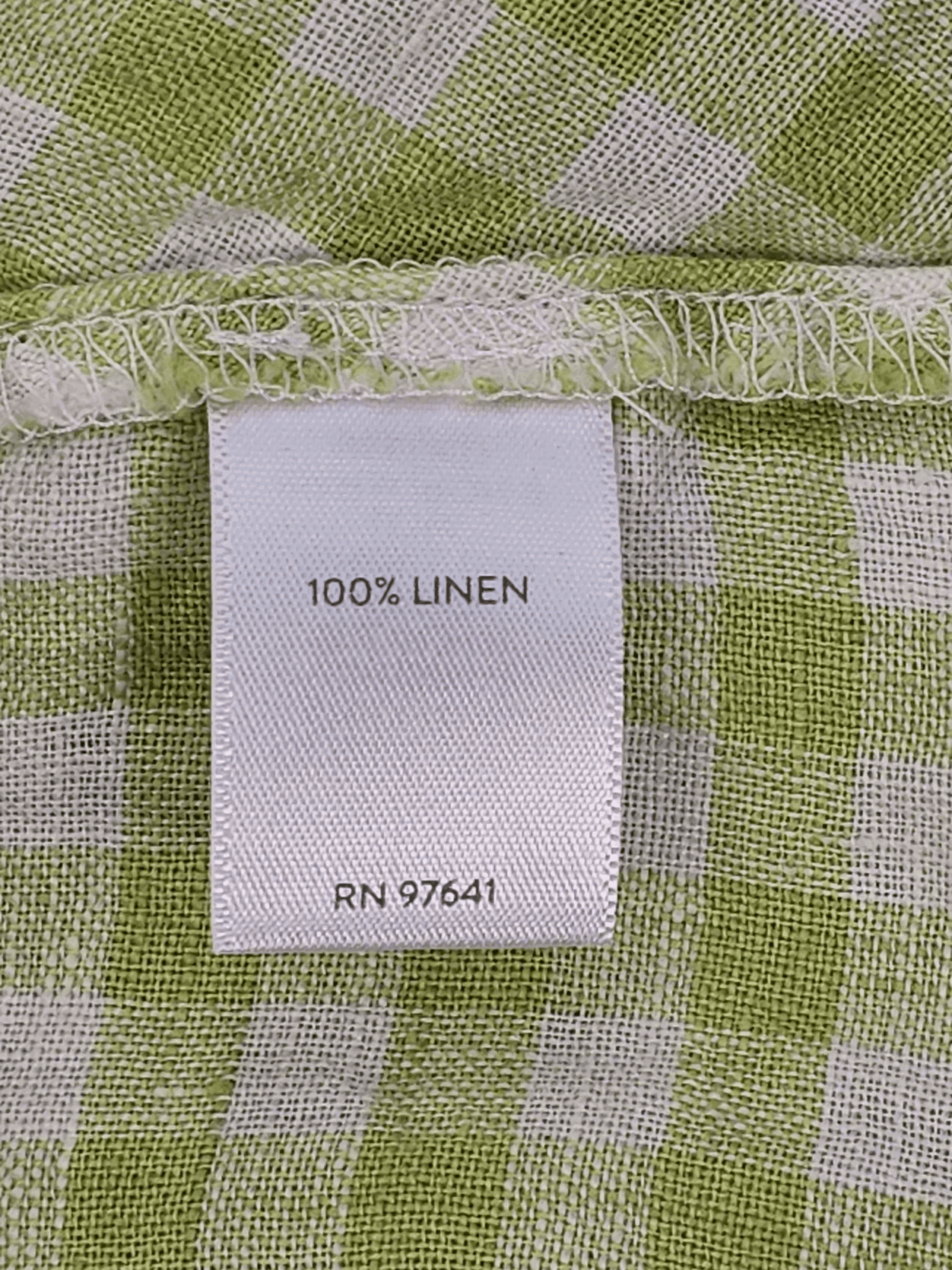Fabric content tag from J. Jill green and white checked pullover top women’s plus size 2X