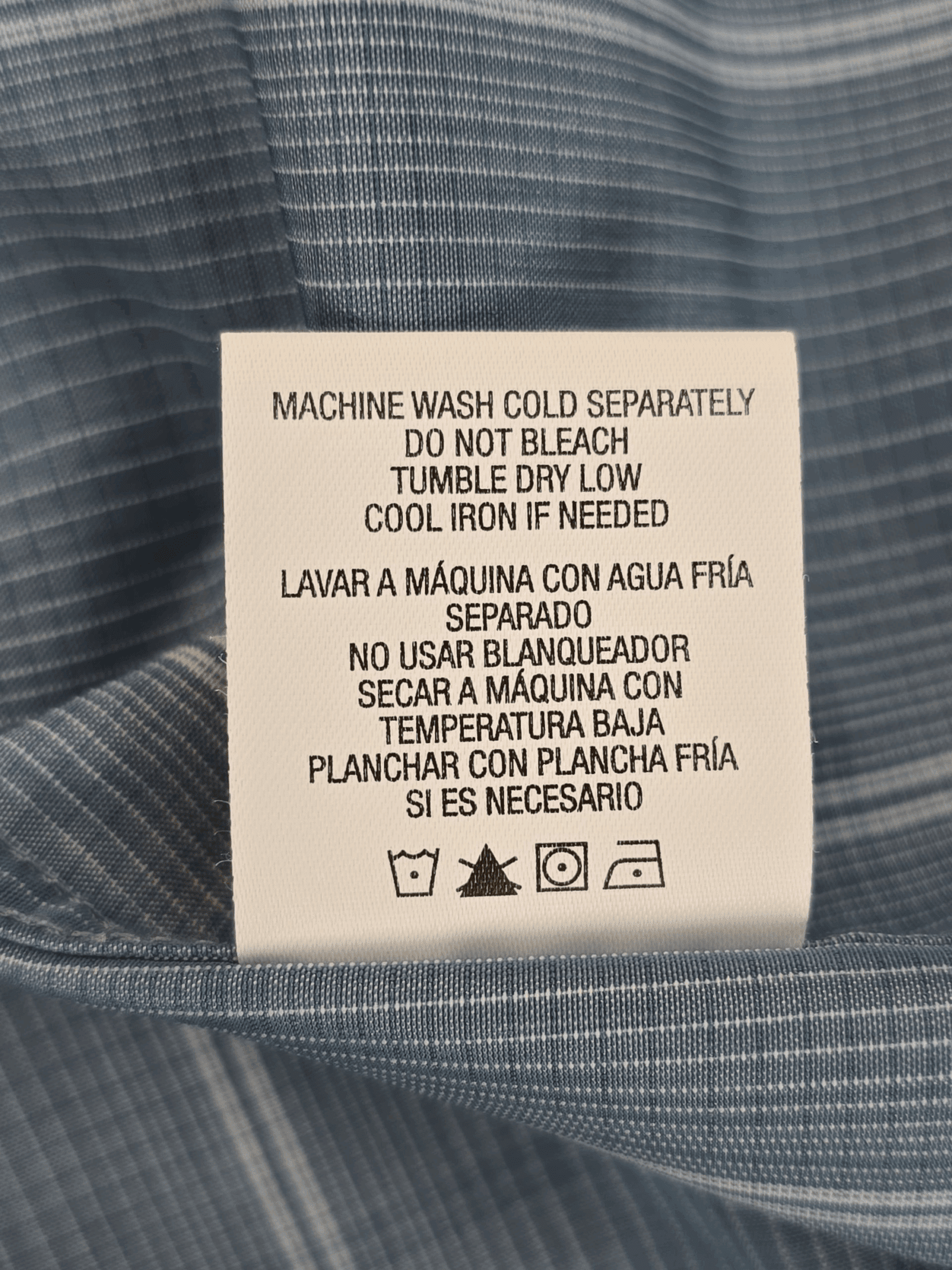 Garment care tag for David Taylor Luxury Microfiber blue and white checked button-up shirt showing washing and drying directions.