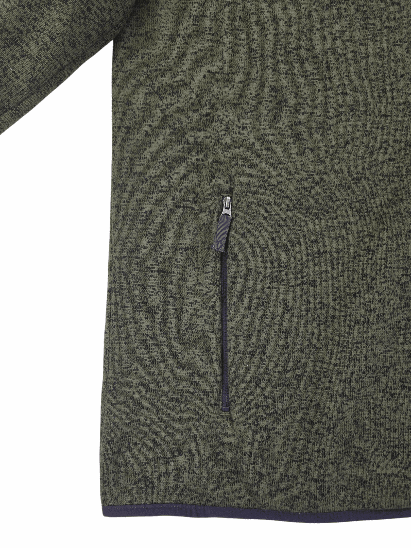 Close-up of a greenish-gray fabric with a black zipper pocket.