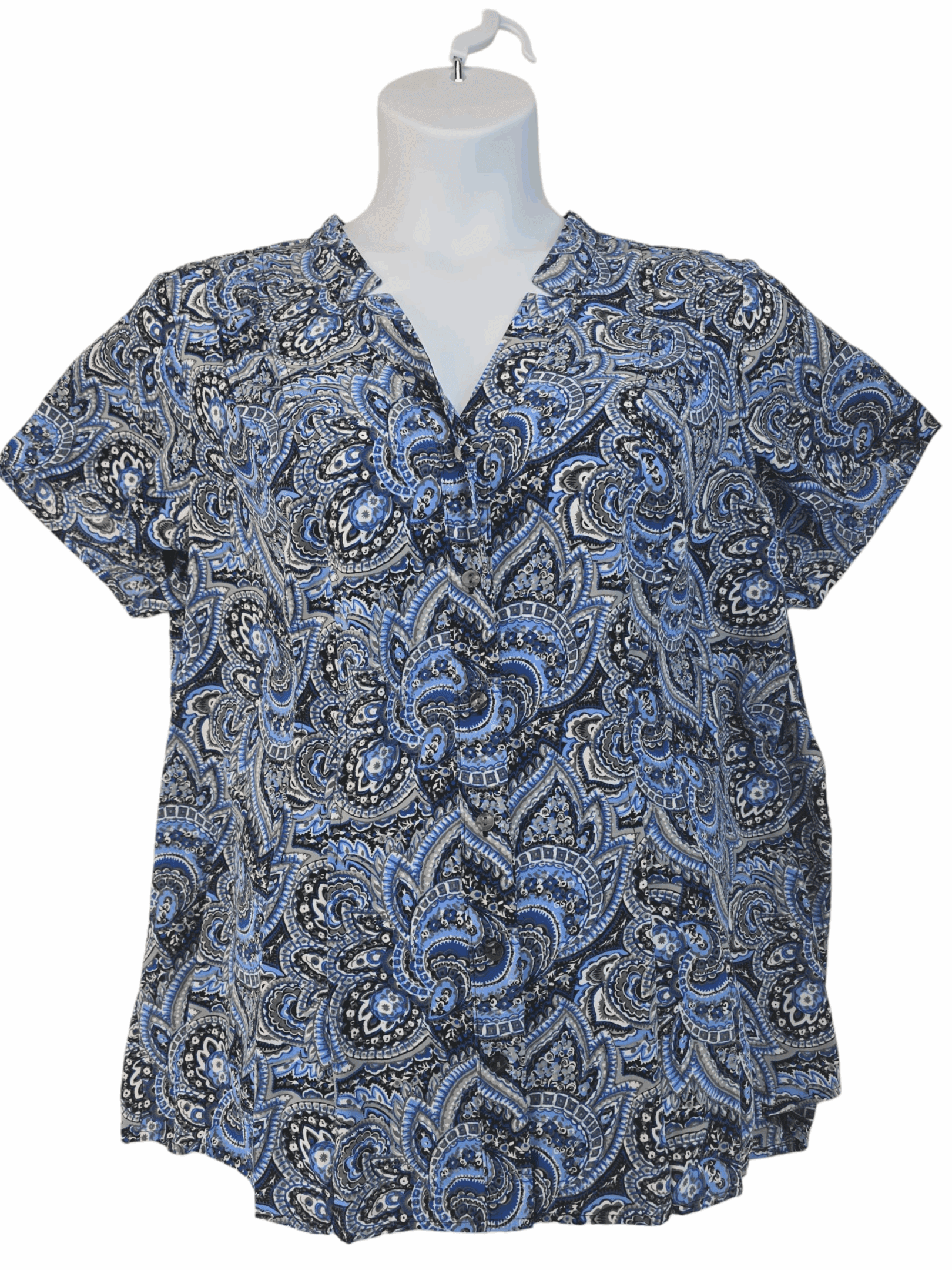 Blue paisley patterned short-sleeve blouse on a mannequin.
