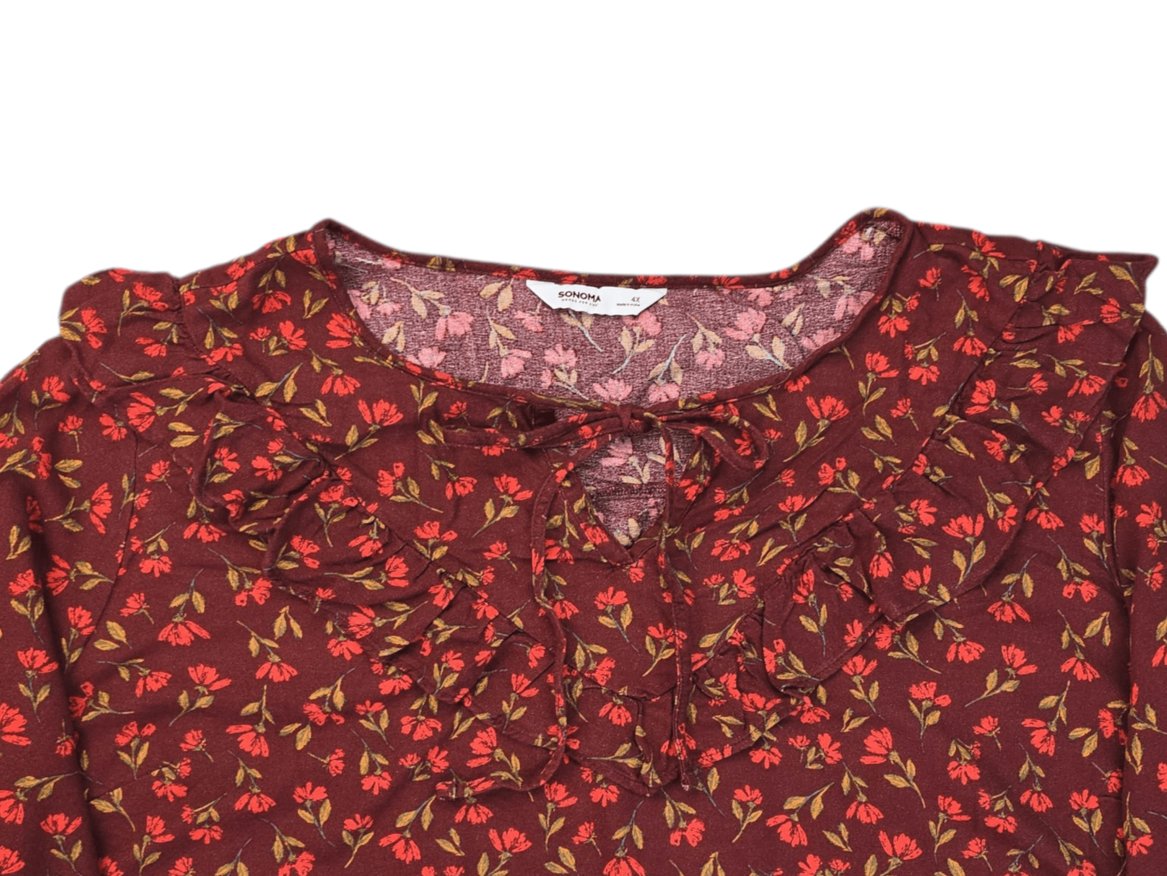 Close-up of Sonoma rust floral rayon pullover top showing neckline and floral fabric design.