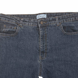 A pair of blue denim jeans with front pockets and a button fly.