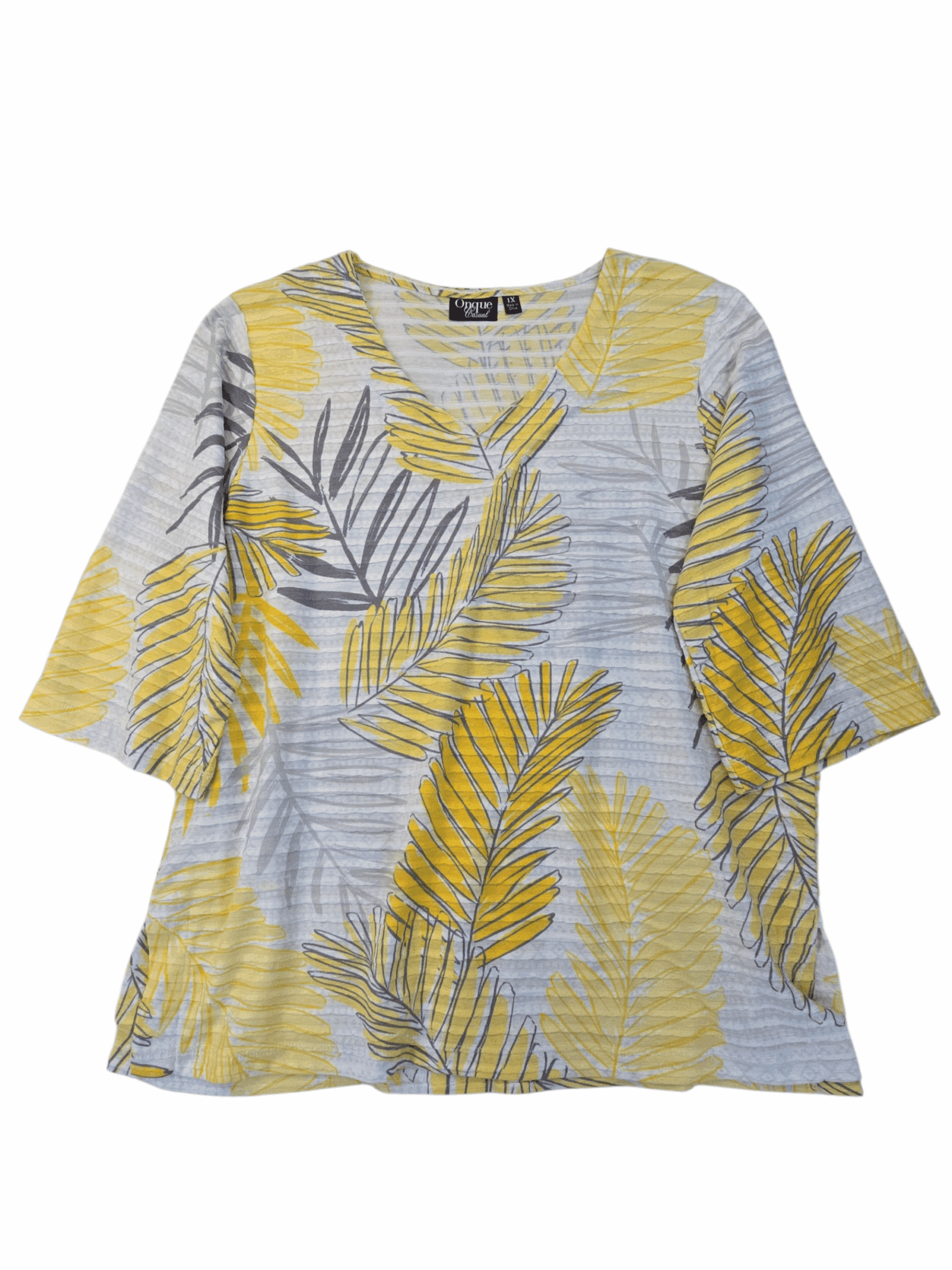 Striped shirt with yellow and gray leaf patterns.