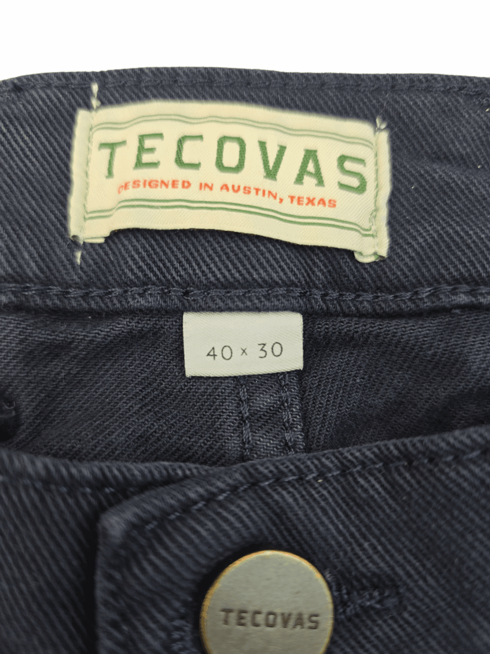Tecovas brand and size tag on navy blue comfort jeans men’s size 40x30