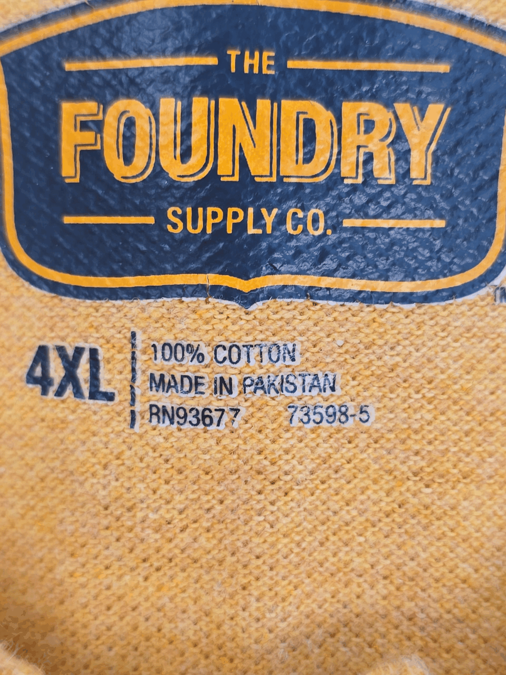 Fabric content tag from The Foundry bright yellow polo shirt men’s big & tall size 4X