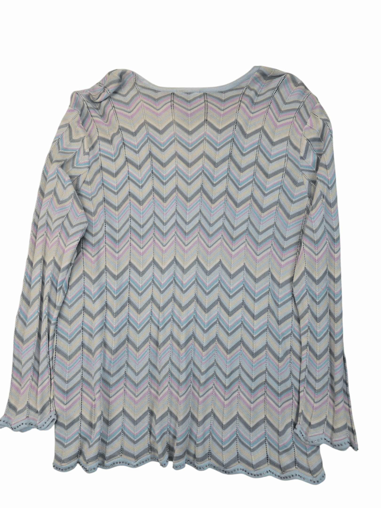 Long-sleeve top with a multicolored zigzag pattern.