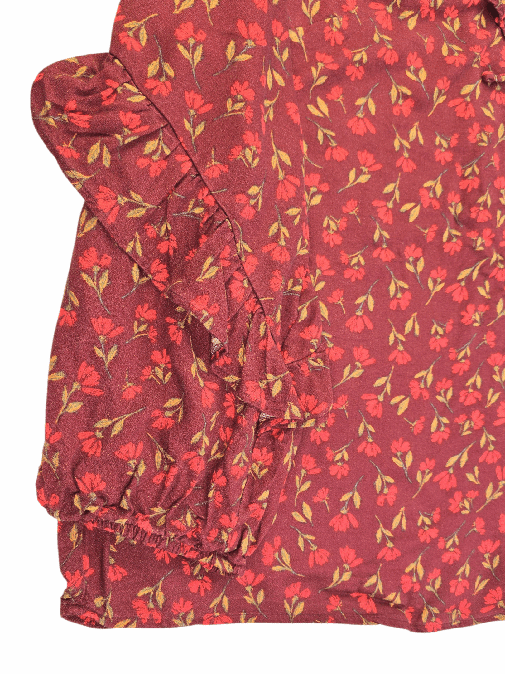 Close-up of Sonoma rust floral rayon pullover top sleeve showing ruffle detail and floral pattern.
