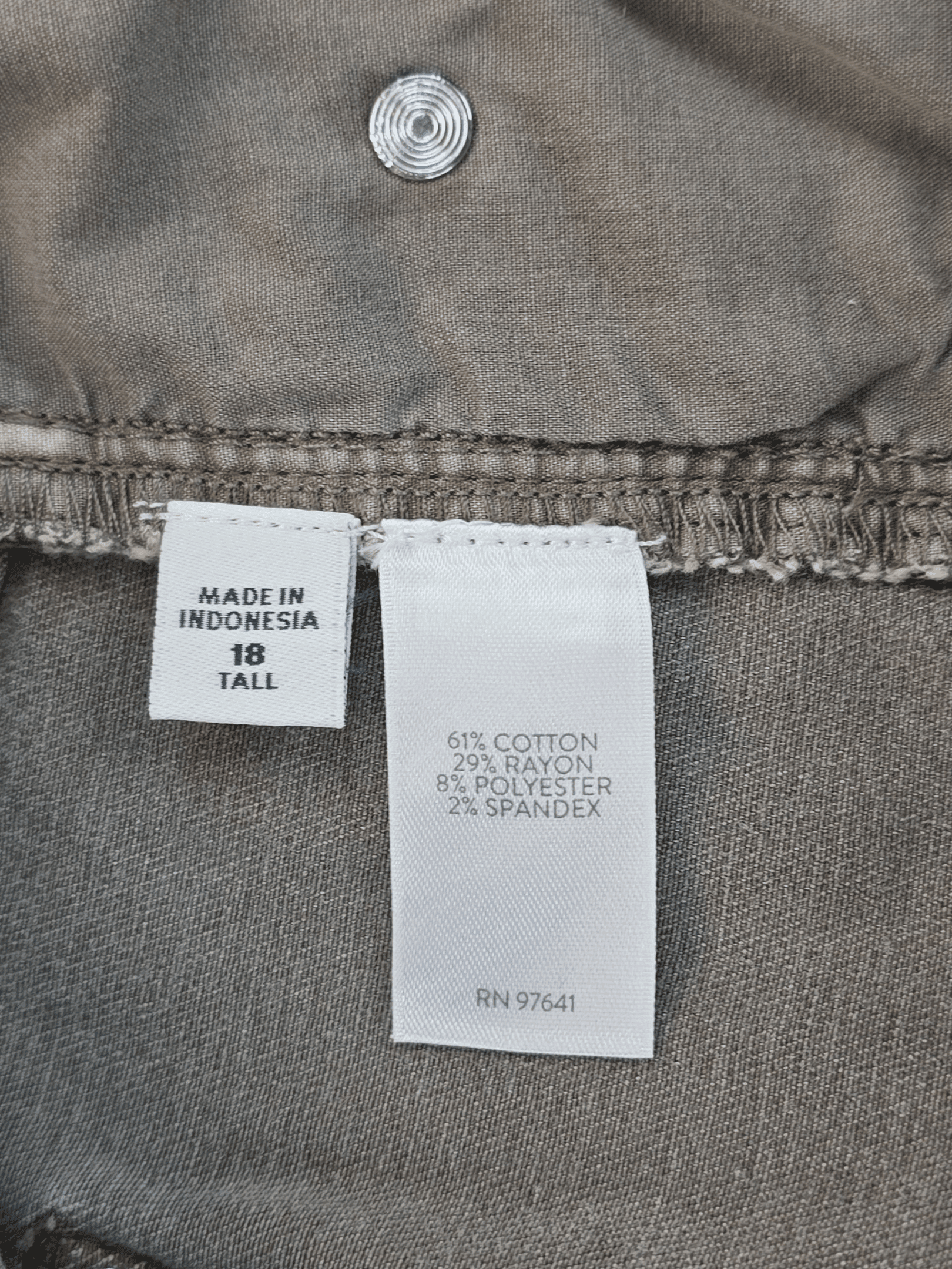 Fabric content tag from J. Jill Authentic Fit slim ankle green denim jeans size 18T