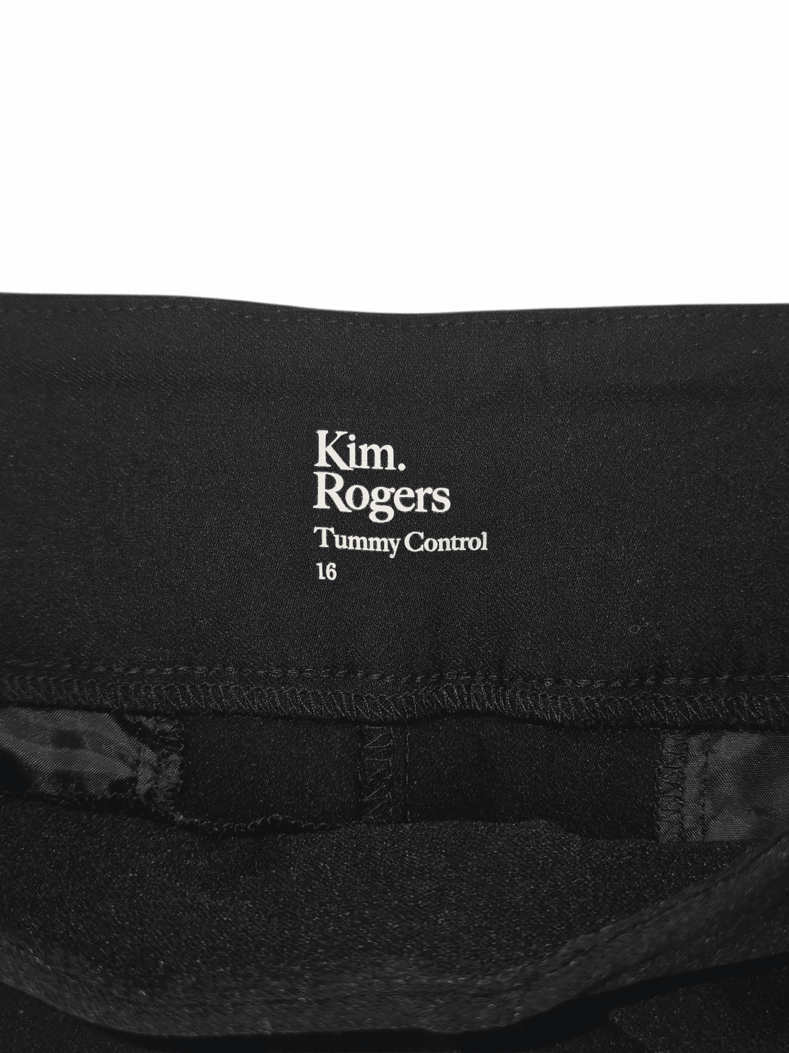 Label inside clothing showing brand and size information.