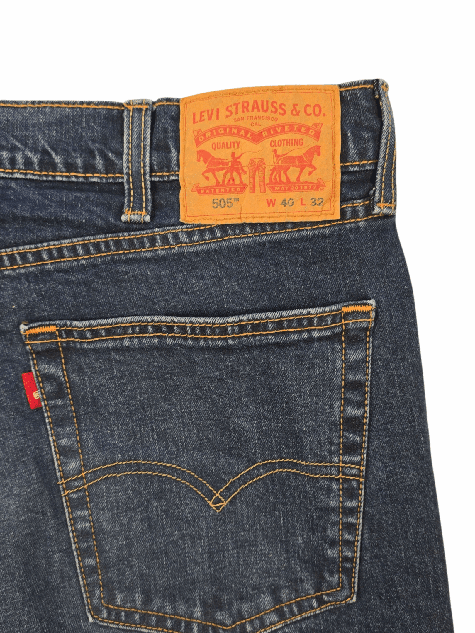 Close-up of Levi’s leather brand patch on back waistband of men’s size 40x32 505 Classic Fit Stretch Jeans