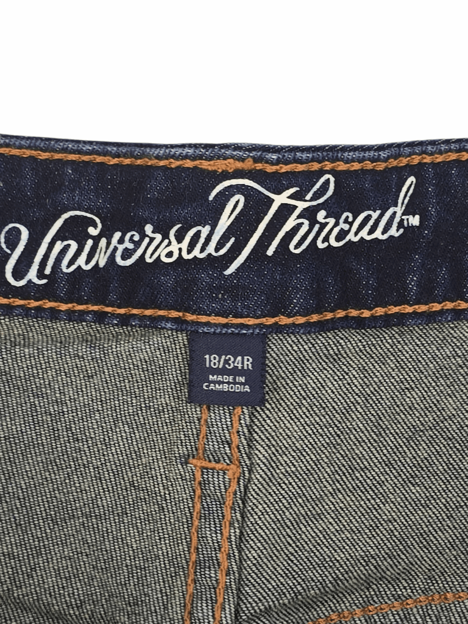 Universal Thread brand and size tag on blue kick boot crop jeans women’s plus size 18/34