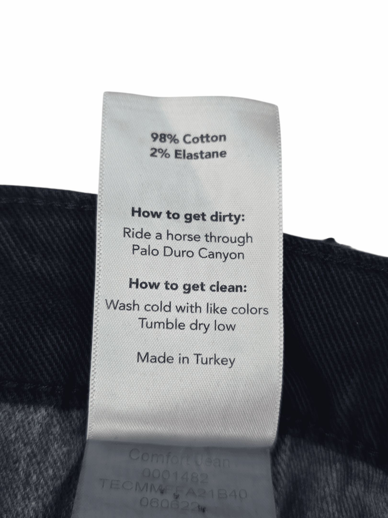 Fabric content tag from Tecovas navy blue comfort jeans men’s size 40x30