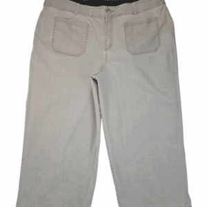 Beige pants with two front pockets and a black waistband.