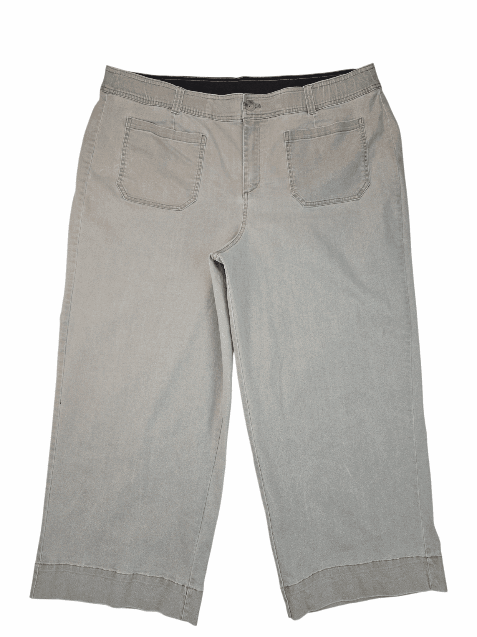 Beige pants with two front pockets and a black waistband.
