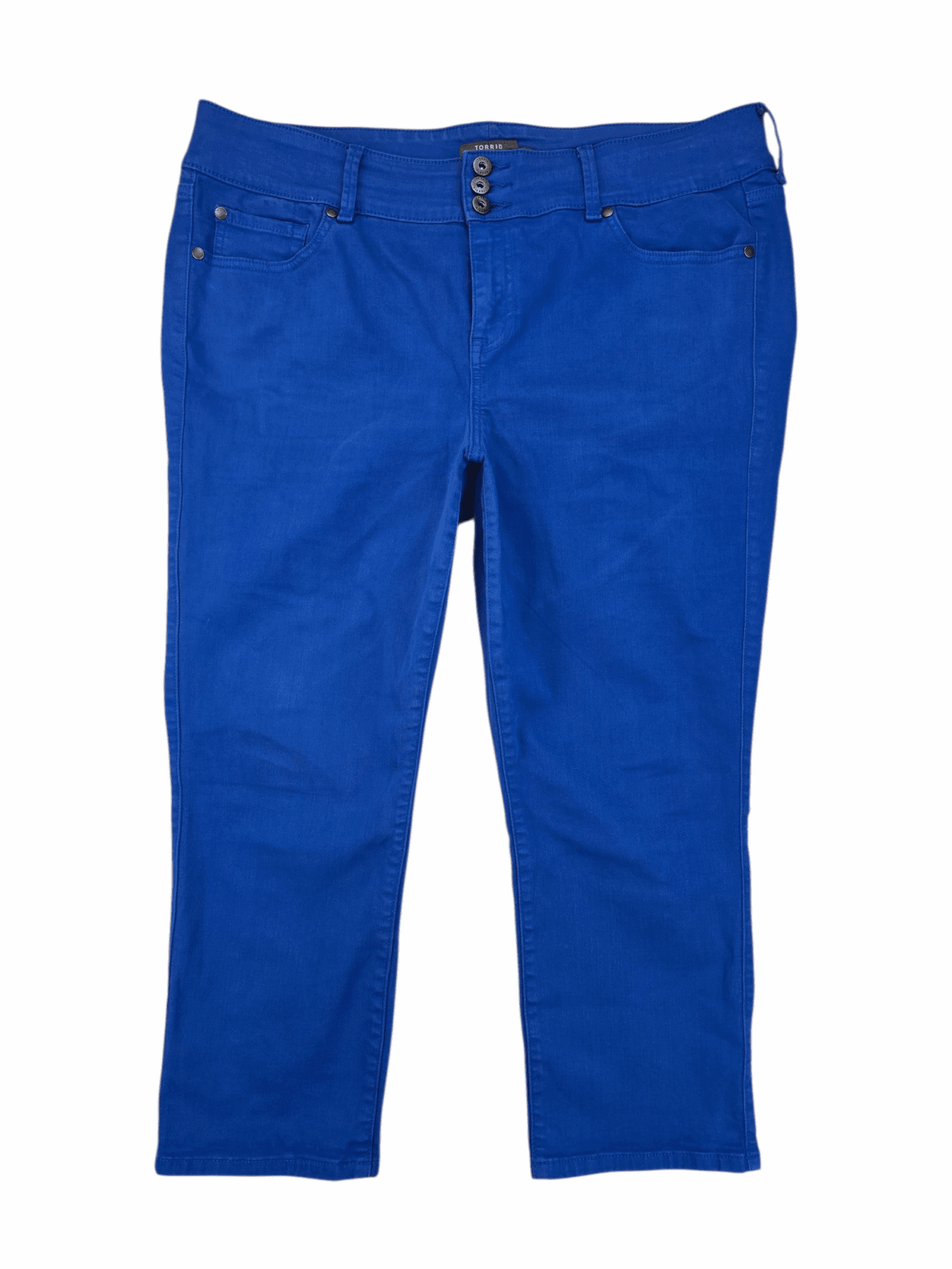 A pair of bright blue jeans laid flat on a white background.