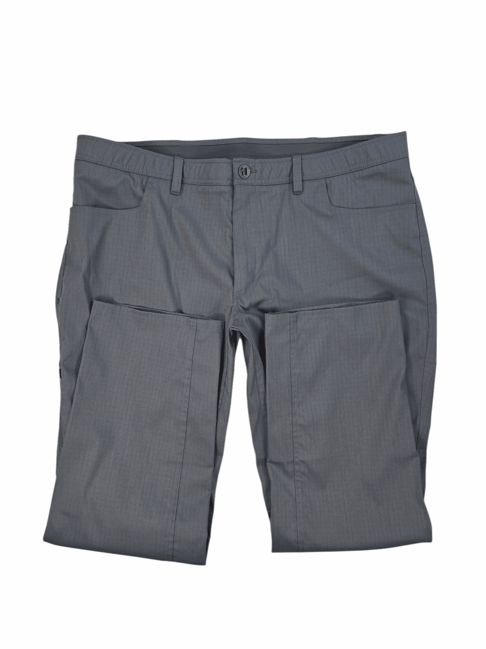 Close-up of front of Under Armour men’s Big & Tall size 44 Storm Quick-Dry ripstop pants showing fabric and zipper detail