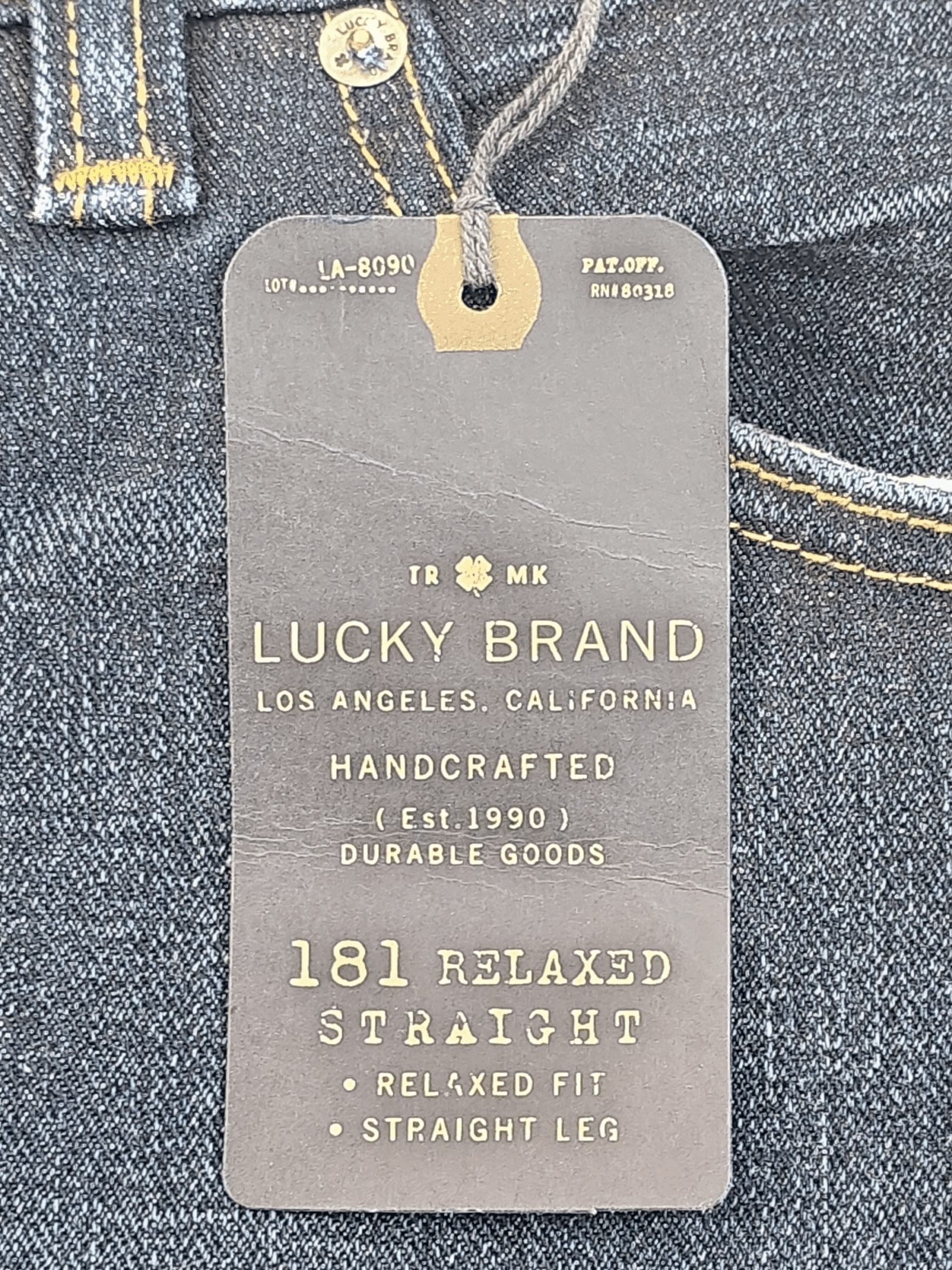 Lucky Brand jeans label showing size and fit details.