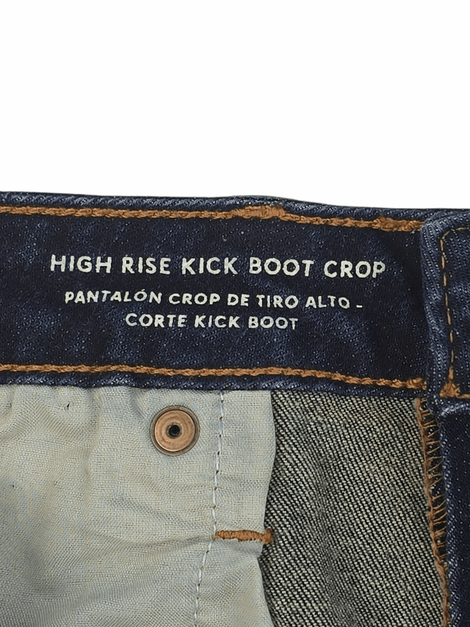 Close-up of jeans label reading 'High Rise Kick Boot Crop'.