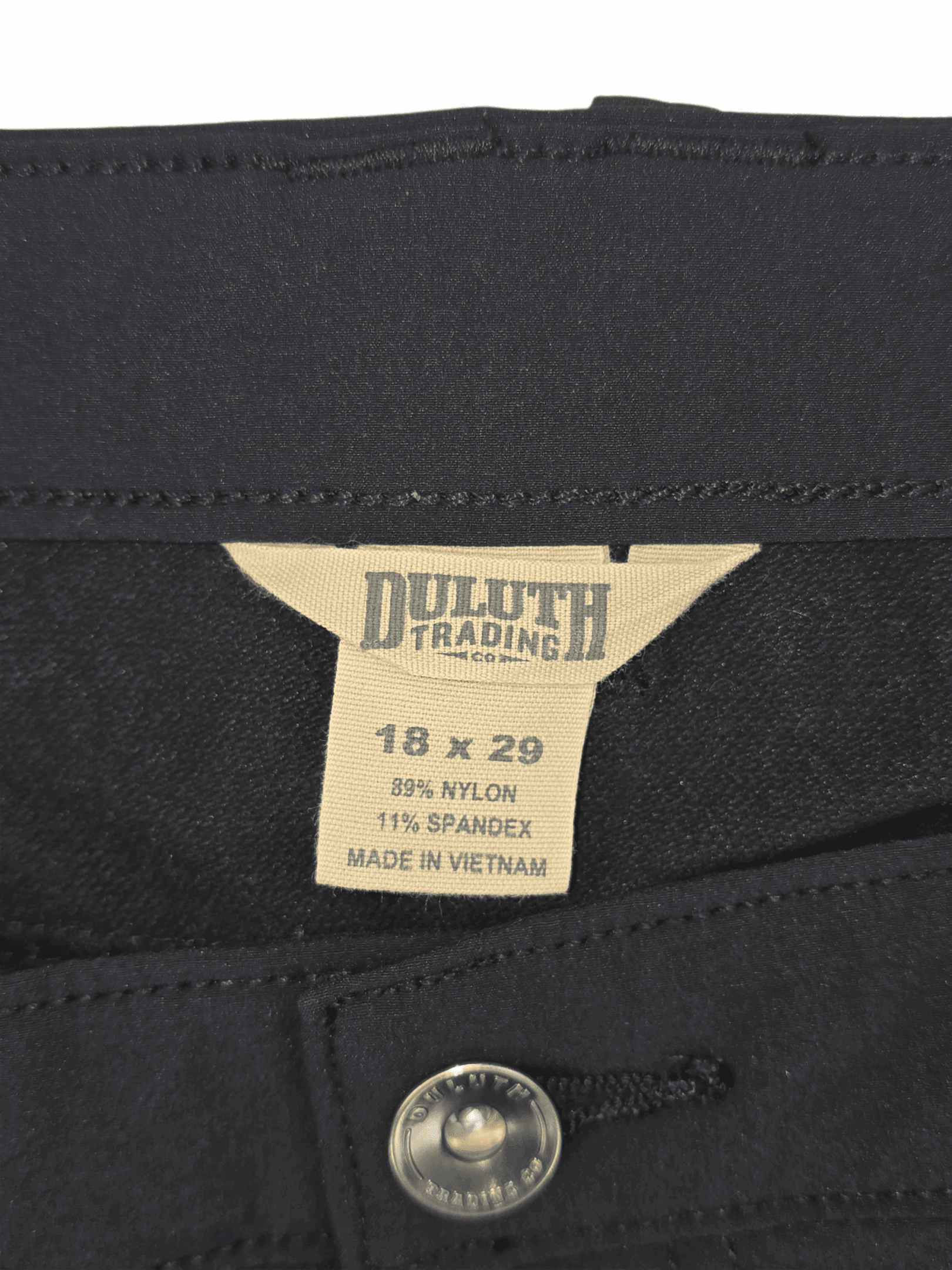 Clothing label from Duluth Trading Co., size 18 x 29.
