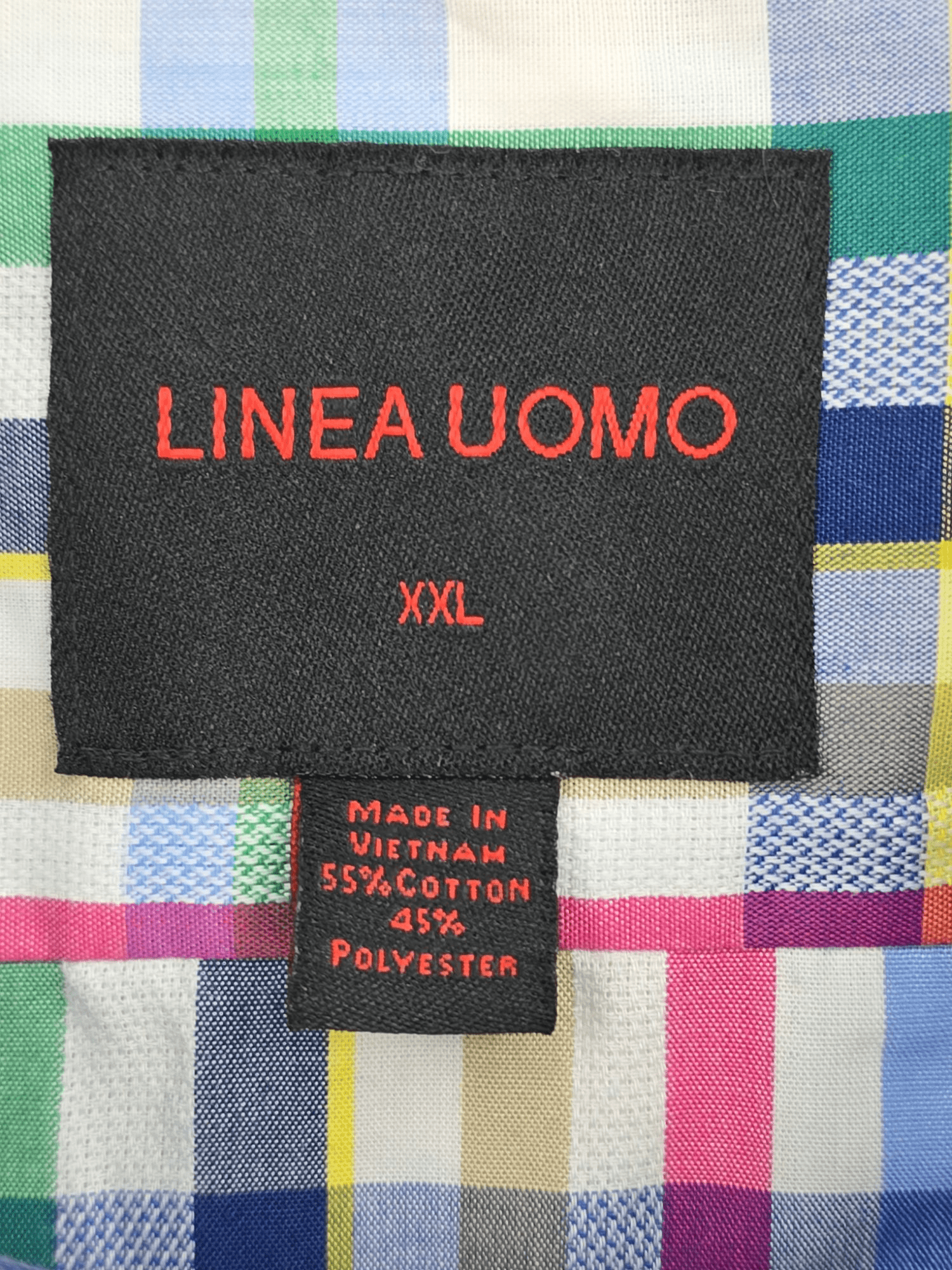 Linea Uomo brand and size tag on multicolored check short sleeve shirt in men’s size XXL.
