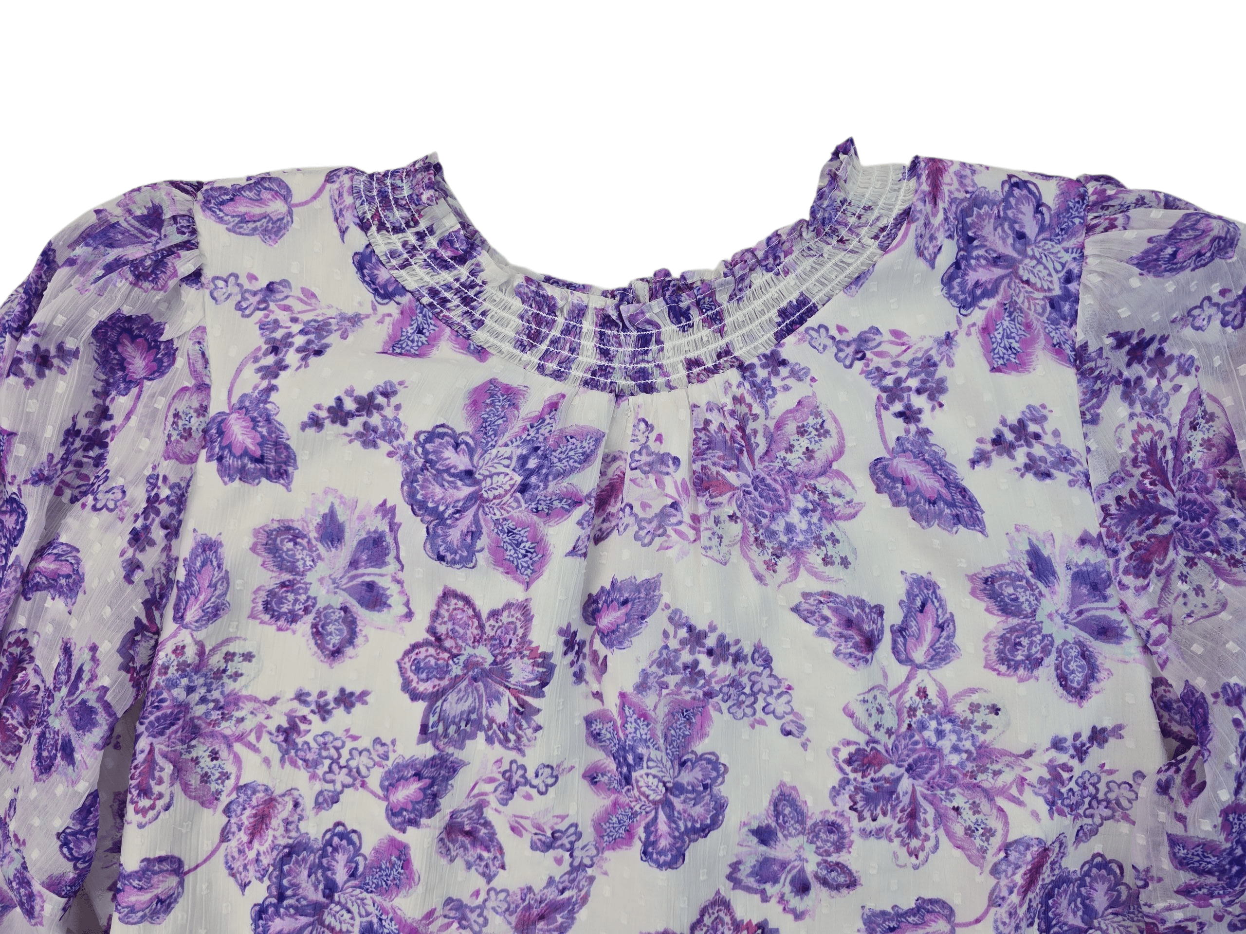 Close-up of a white fabric with purple floral patterns.