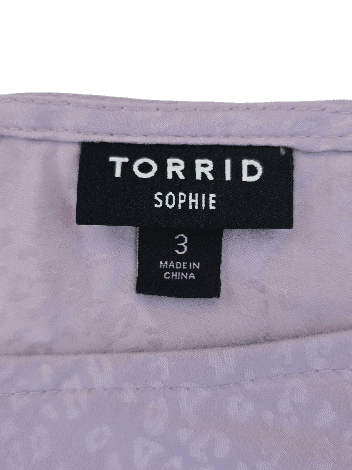 Torrid brand and size tag on Sophie purple animal print adjustable spaghetti strap top women’s plus size 3X