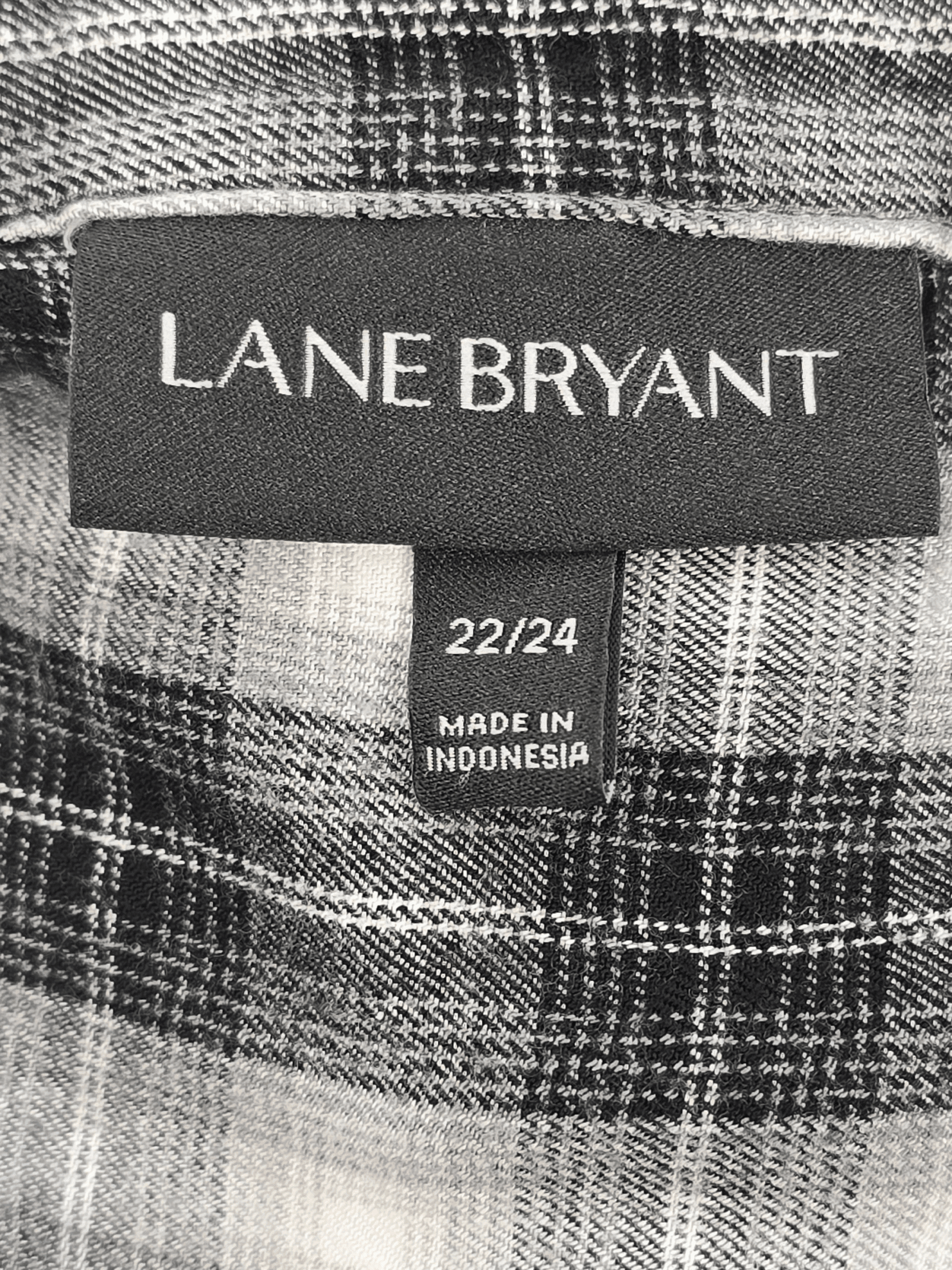 Lane Bryant brand and size tag on black, gray, and white plaid flannel shirt women’s plus size 22/24