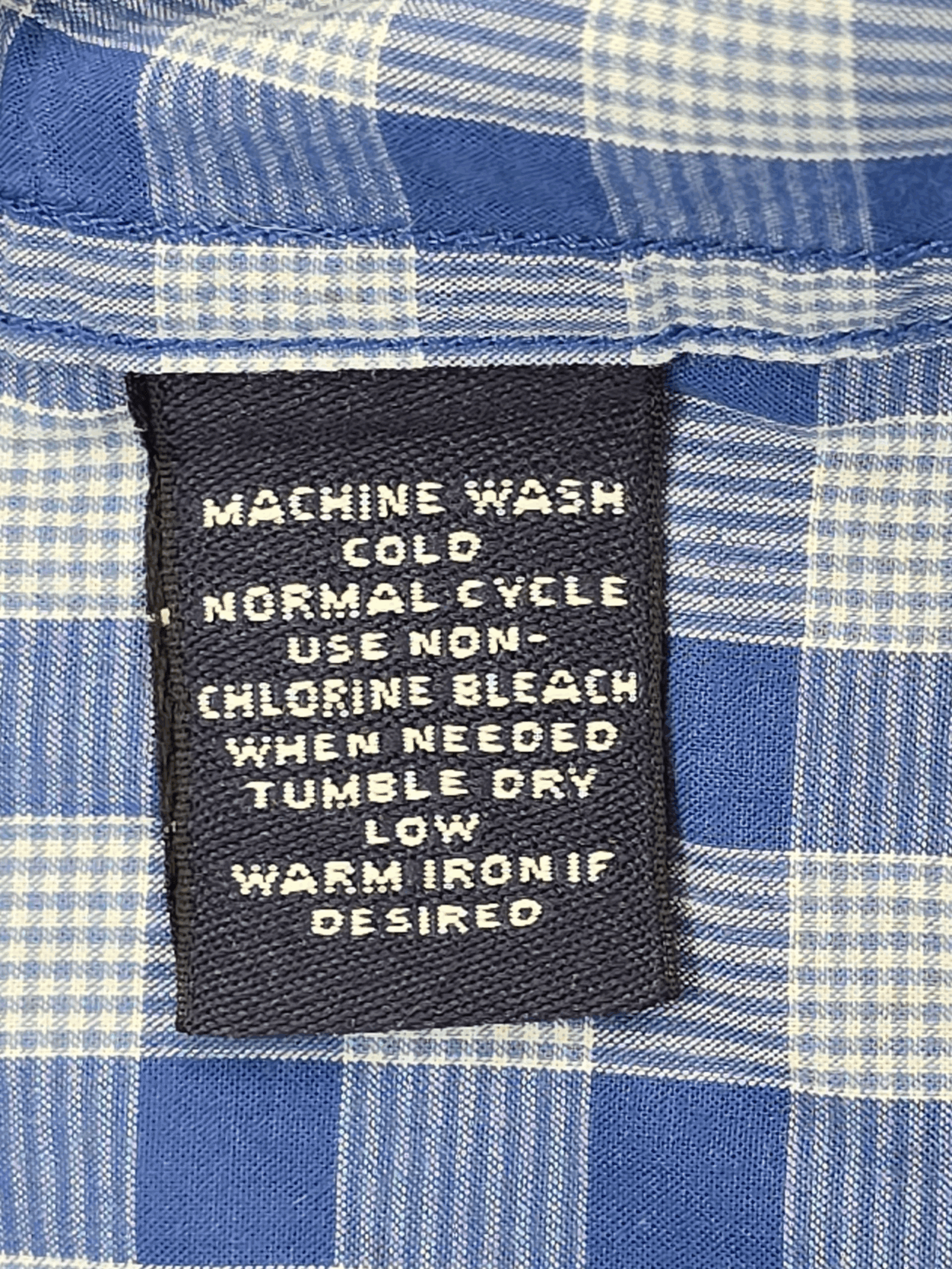 Garment care instruction tag from Roundtree & Yorke blue checked long sleeve shirt men’s big & tall size 3XT