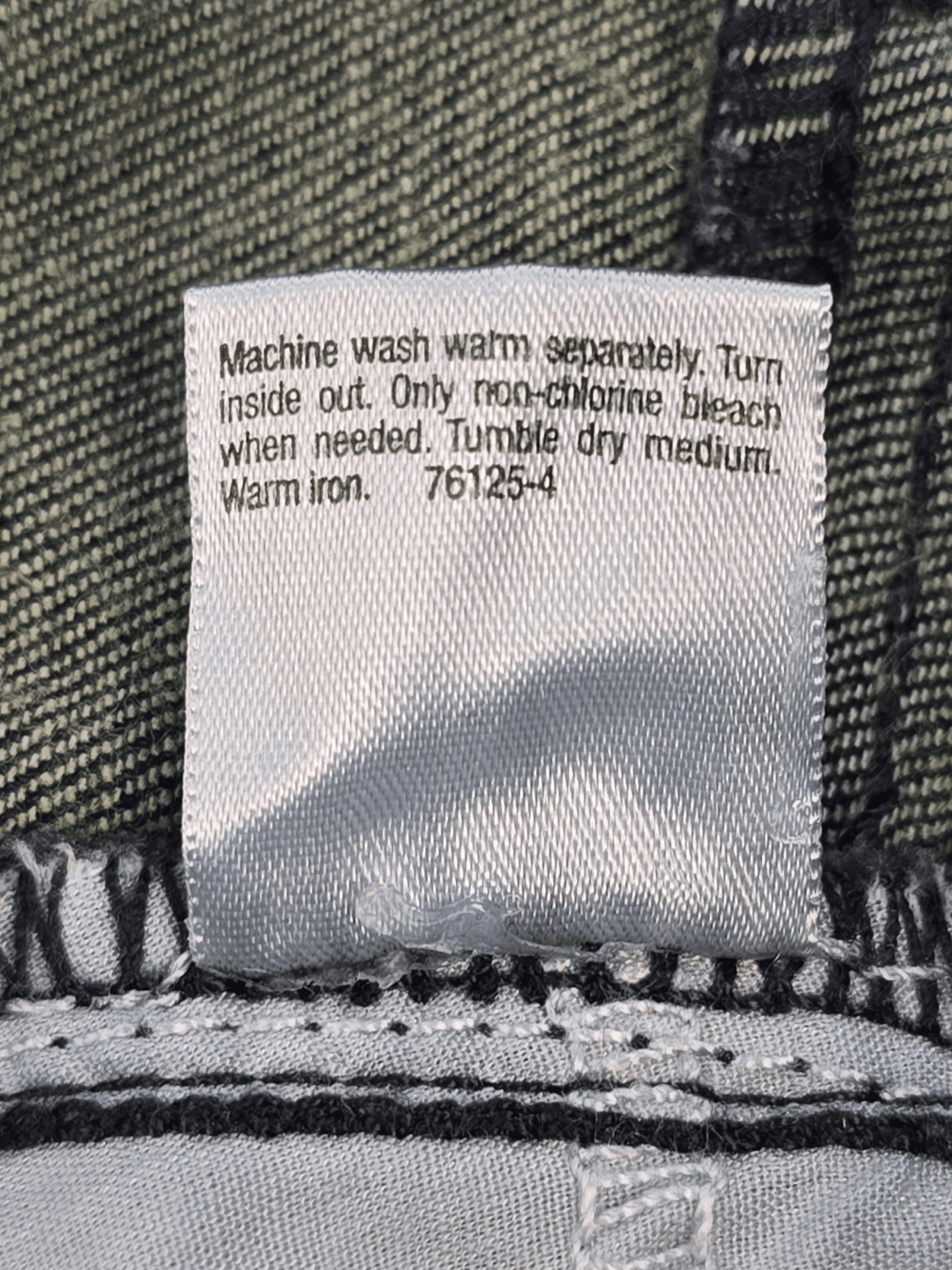 Garment care instruction tag from A New Approach indigo bootcut jeans women’s plus size 22W