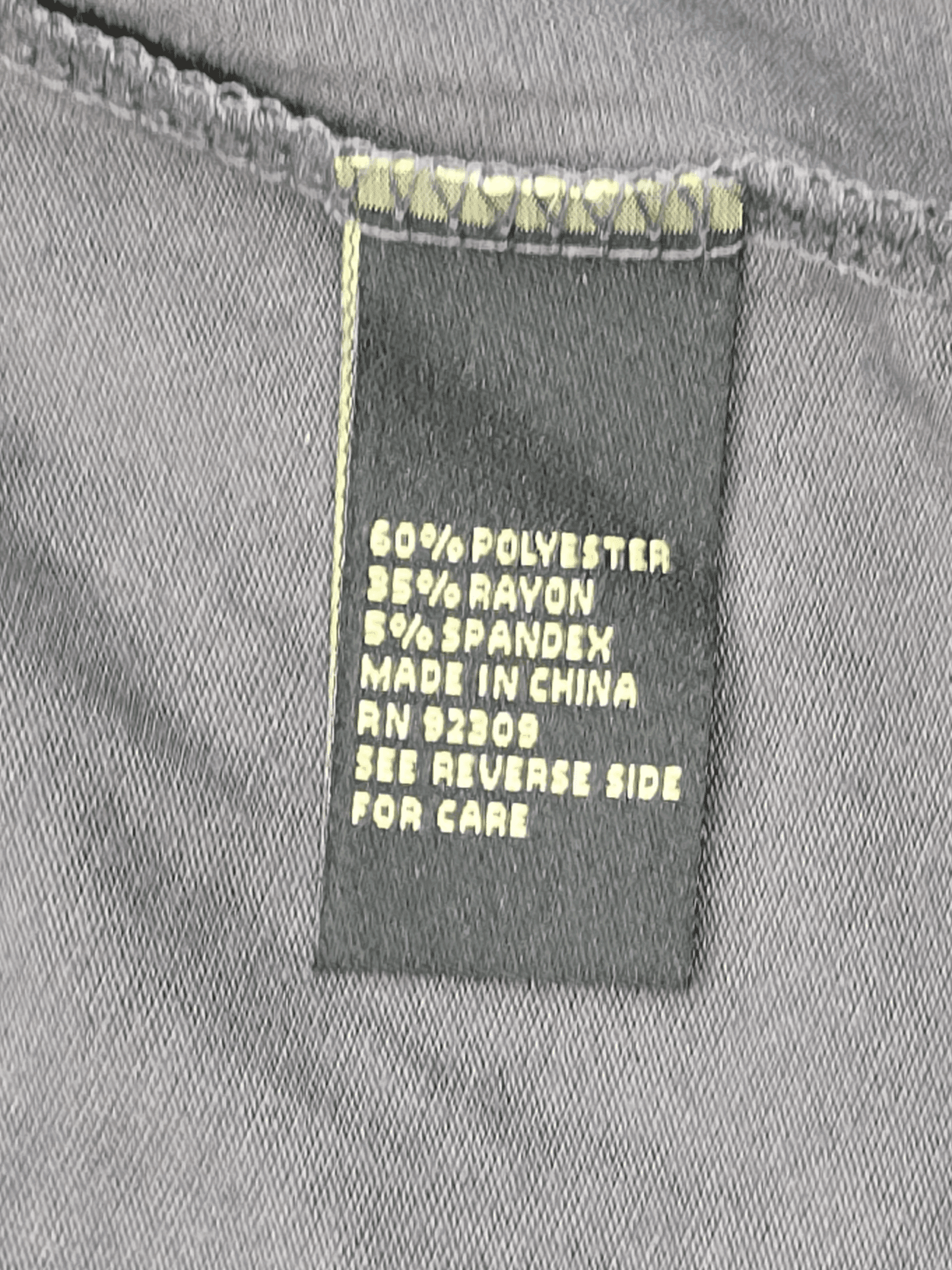 Fabric content tag from Diane Gilman gray layered look pullover top women’s plus size 3X