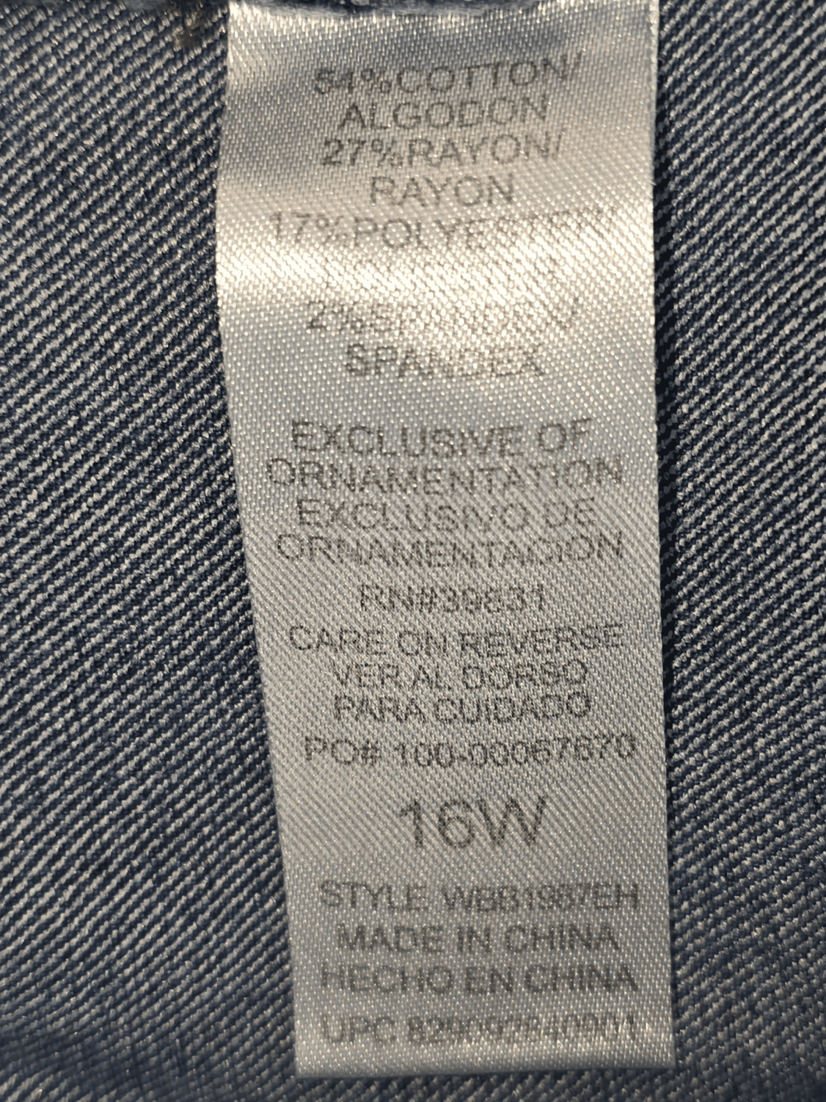 Fabric content tag from Democracy Absolution cropped blue denim pants women’s plus size 16W