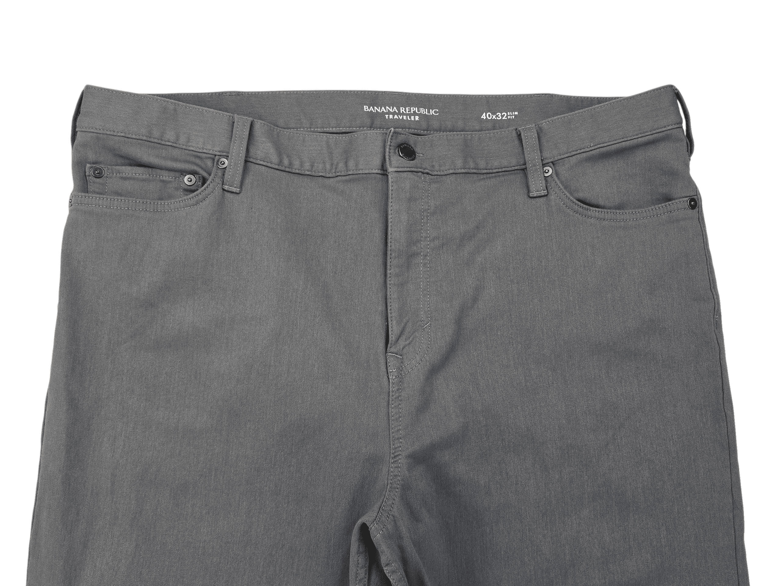 A pair of gray pants laid flat showing front pockets and belt loops.