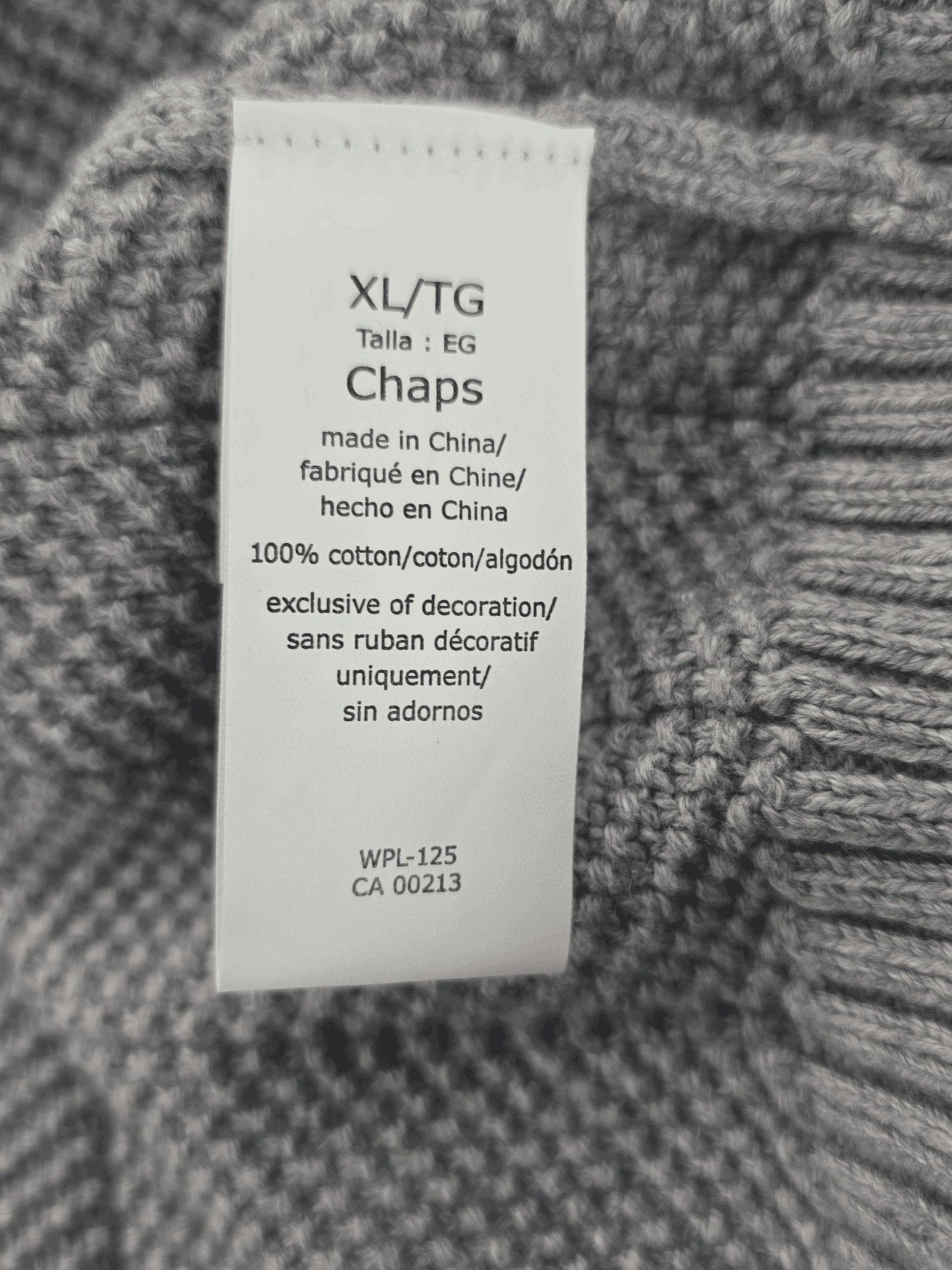 Clothing label showing size XL and brand Chaps.