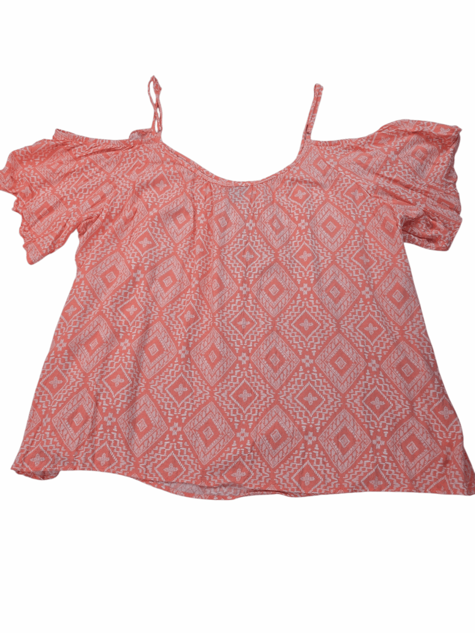 Coral pink cold-shoulder blouse with geometric patterns.