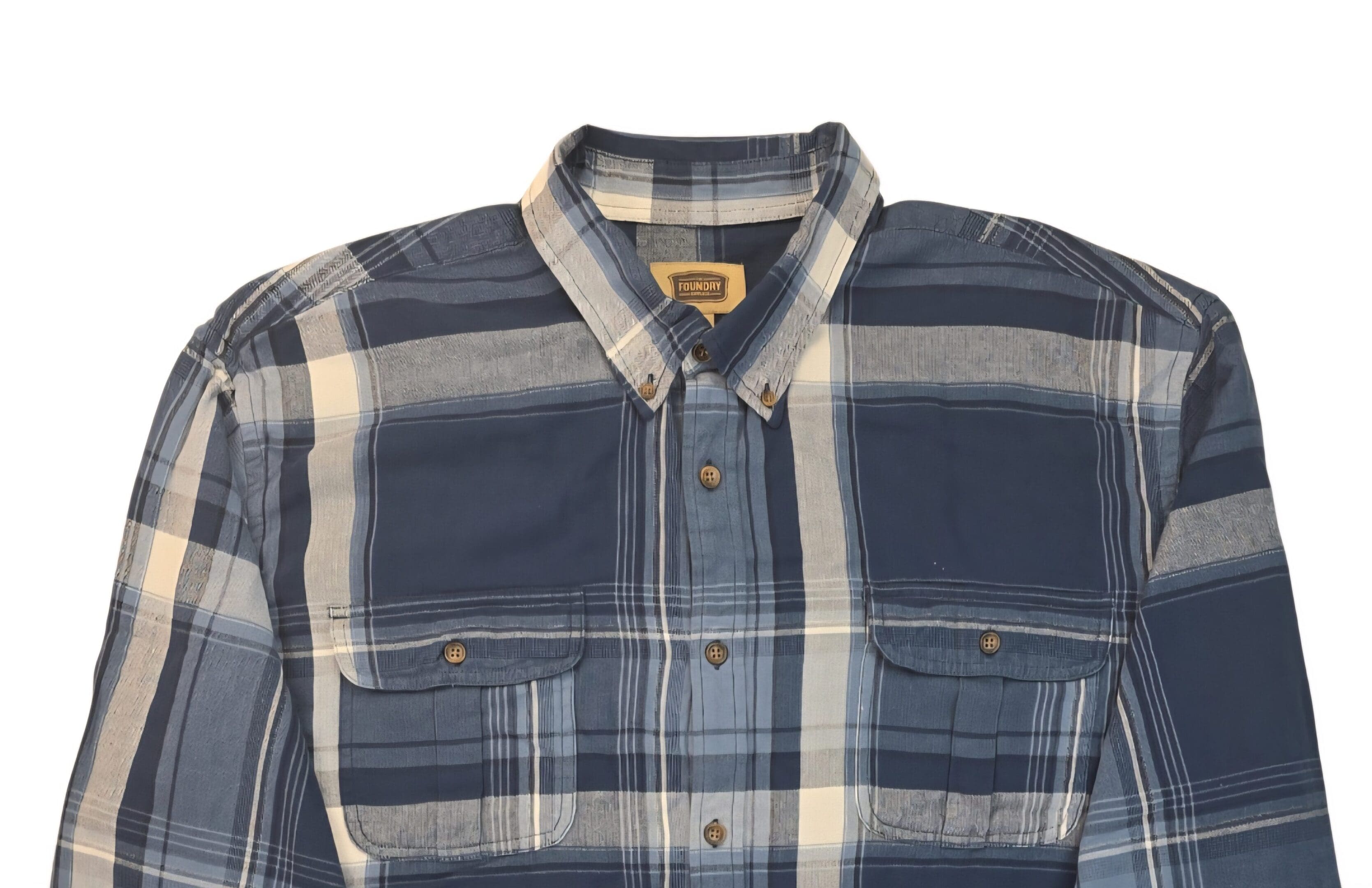 Close-up of The Foundry blue plaid button-up woven shirt showing collar, buttons, and plaid pattern detail.