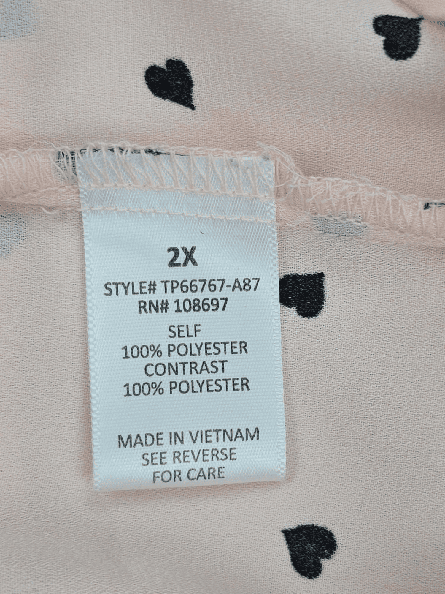 Sweet Rain pink heart print cap sleeve pullover top material content label